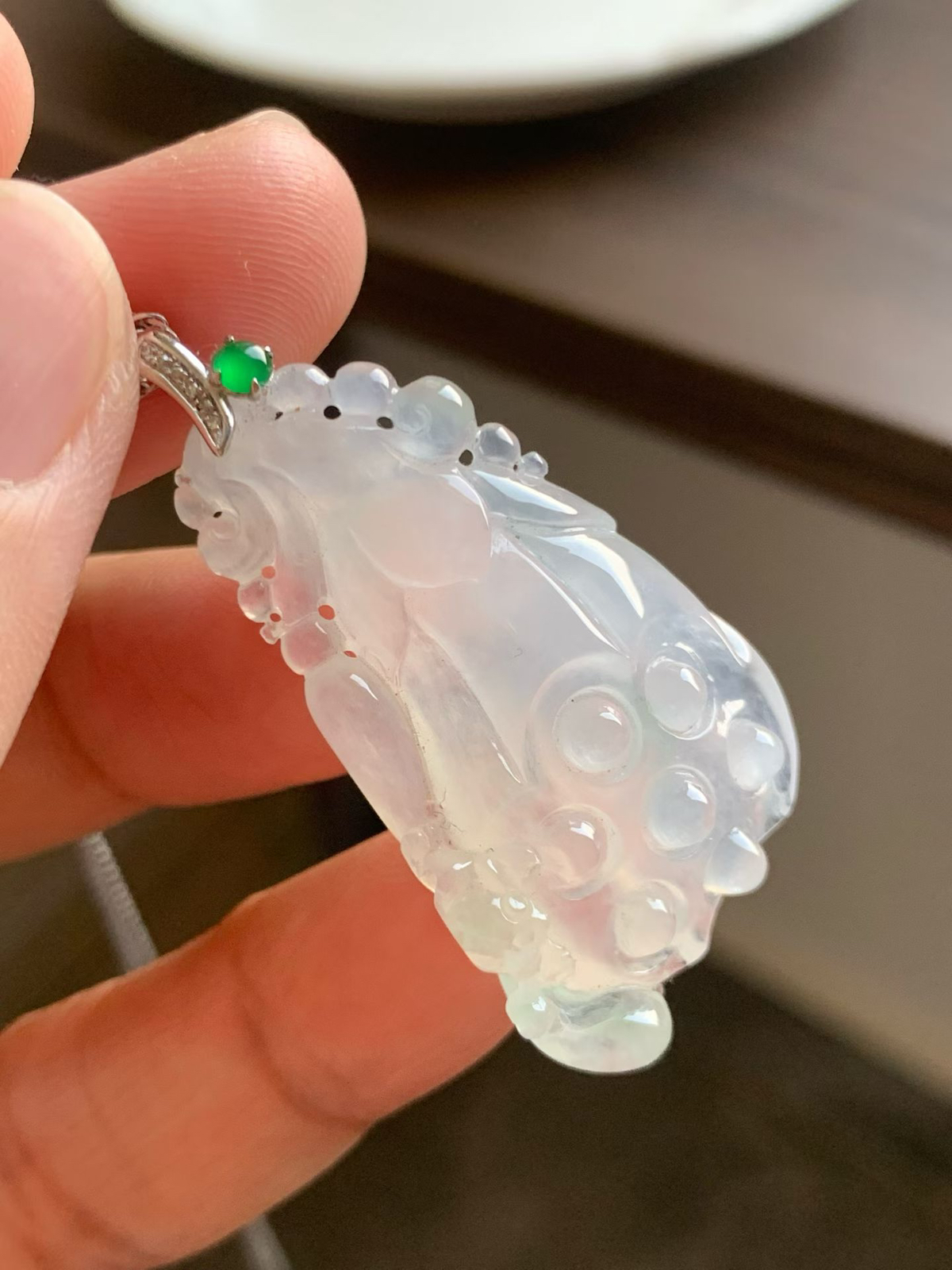 冰莲蓬吊坠

裸石38*22.5*8.2 整体长度42mm
18k金钻石扣头