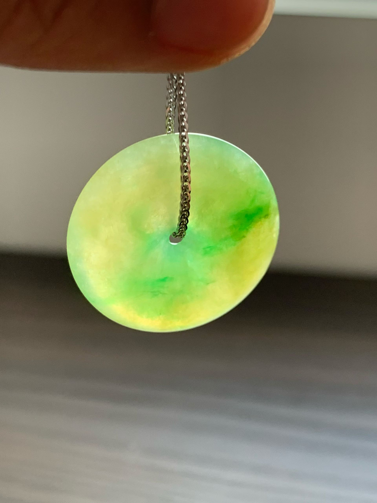 黄加绿平安扣

裸石28*28*5.5