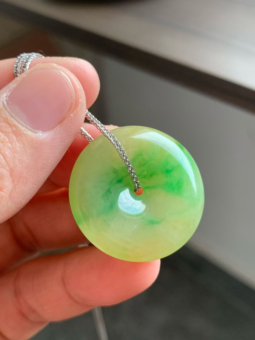 黄加绿平安扣

裸石28*28*5.5