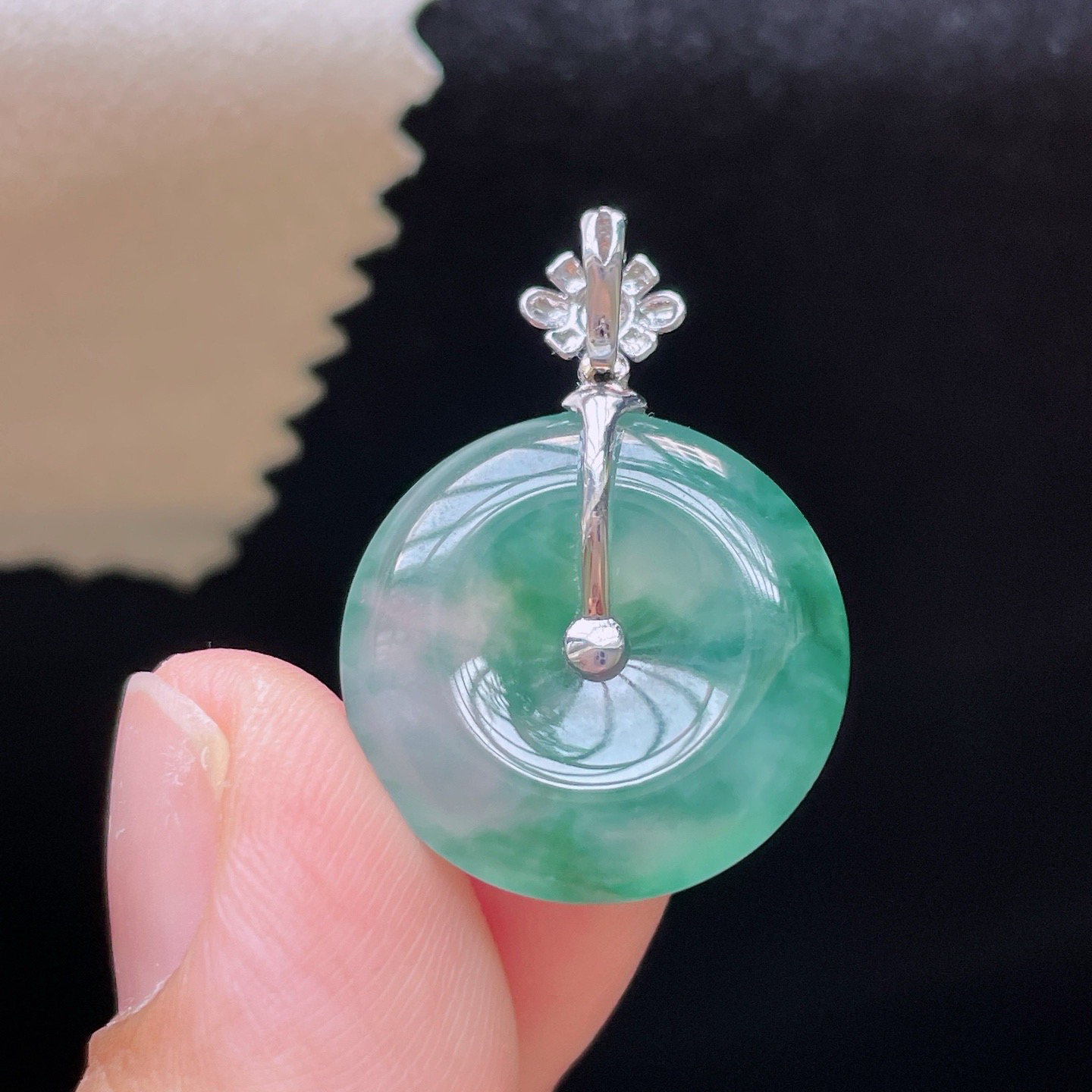 18K 冰种飘花·平安扣

整27.6-19.5-4