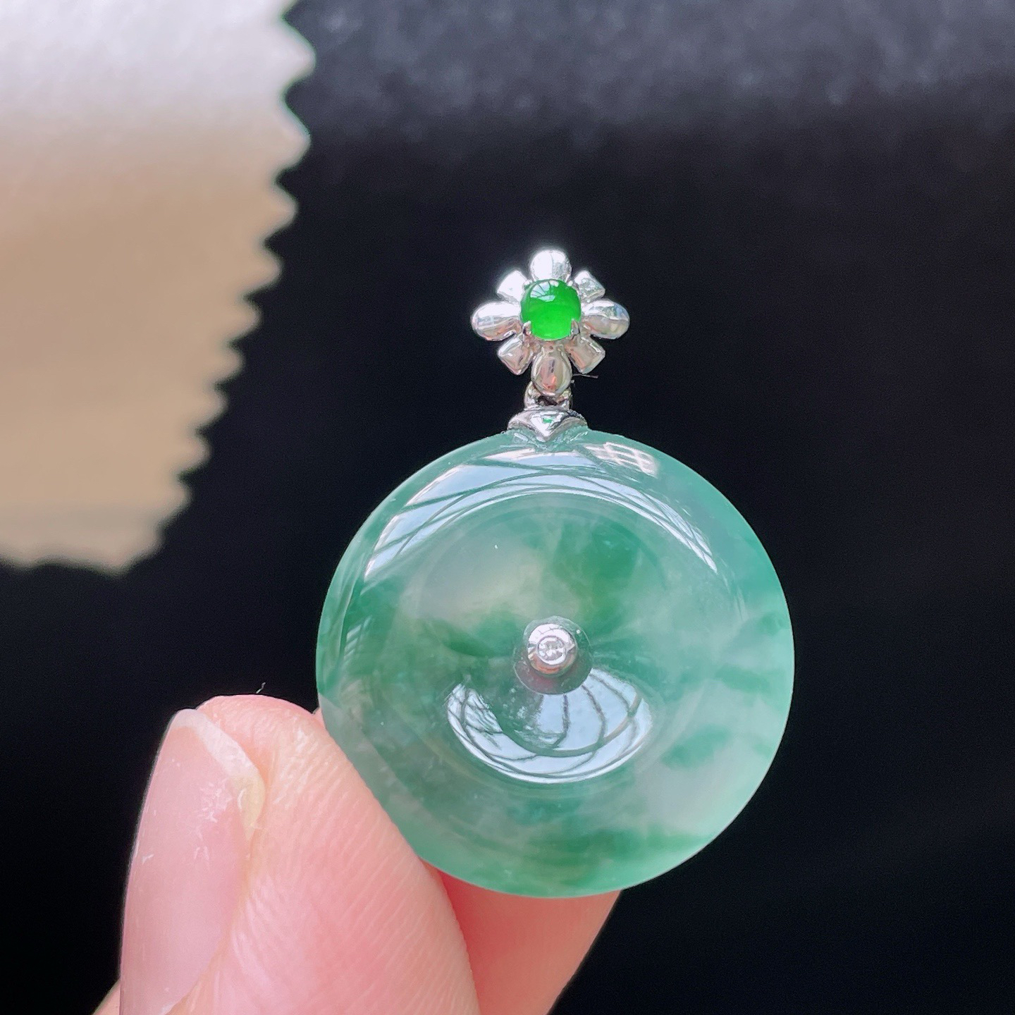 18K 冰种飘花·平安扣

整27.6-19.5-4