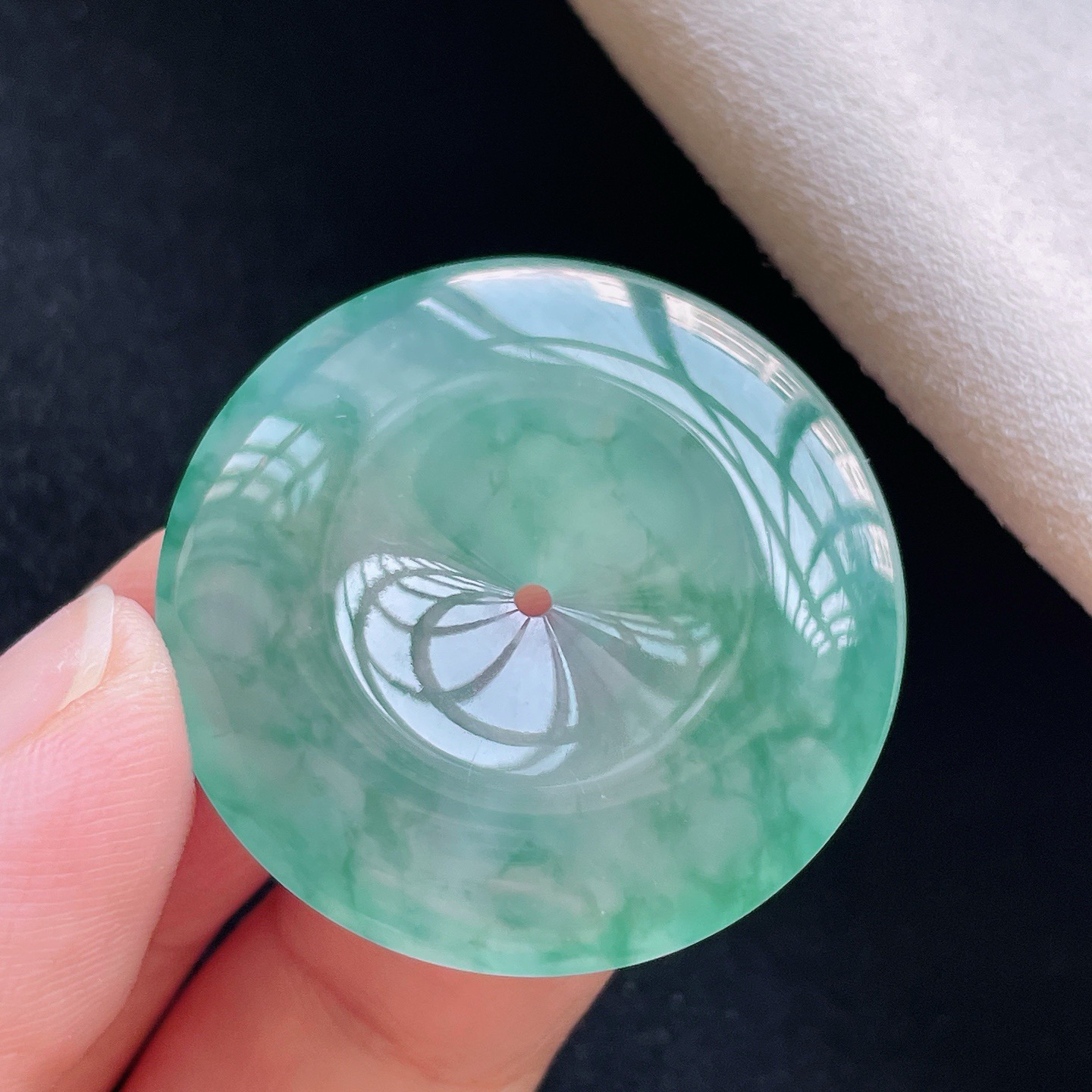 冰种飘花·平安扣

裸33.8-5.8