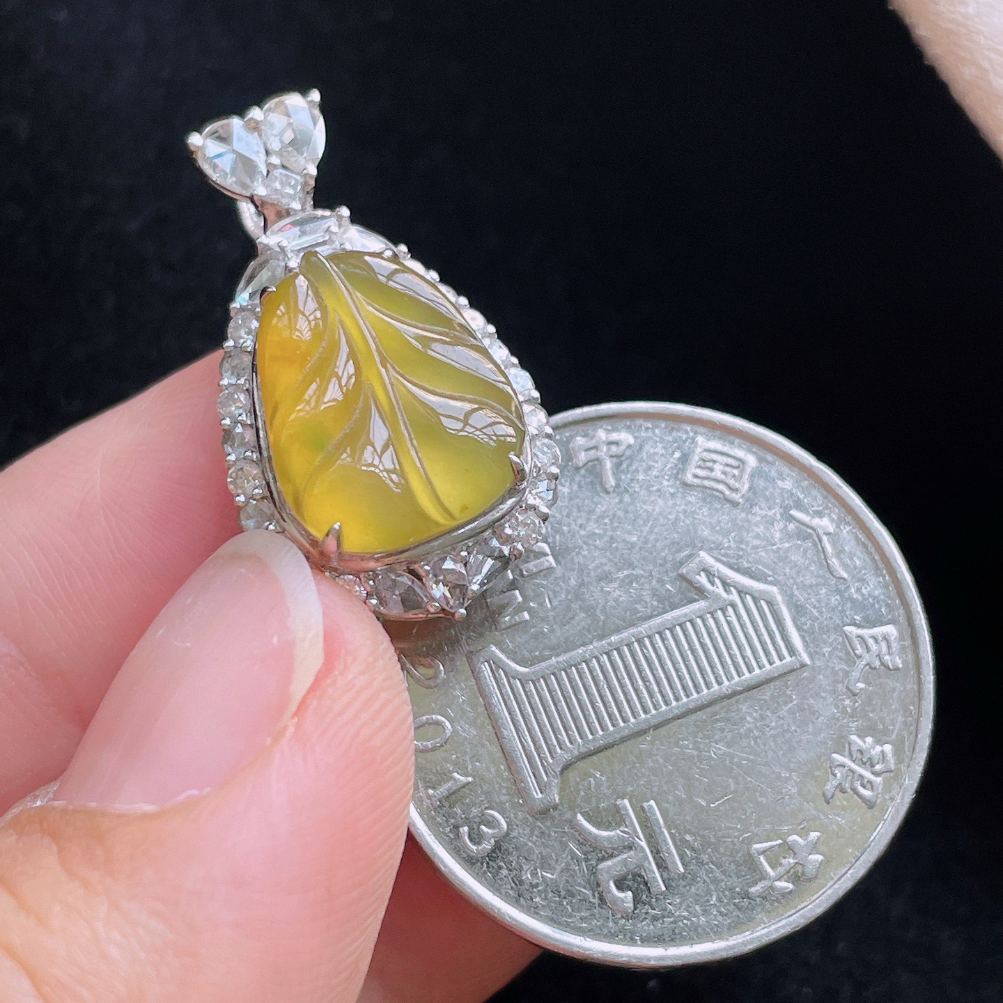 18K 黄翡·叶子

整24.7-14.1-9.6
裸13.2-10.5-2.7