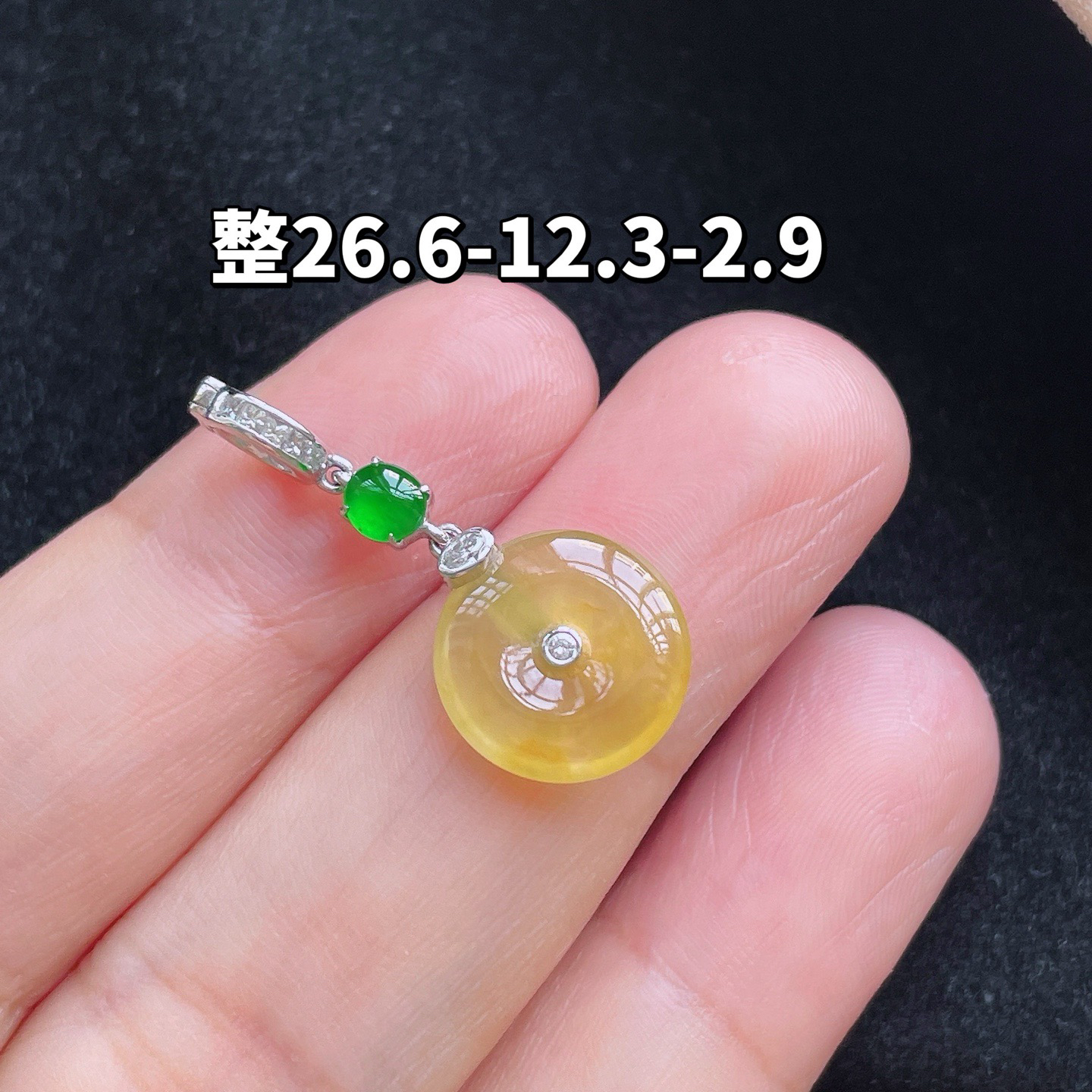 18K 黄翡·平安扣

整26.6-12.3-2.9