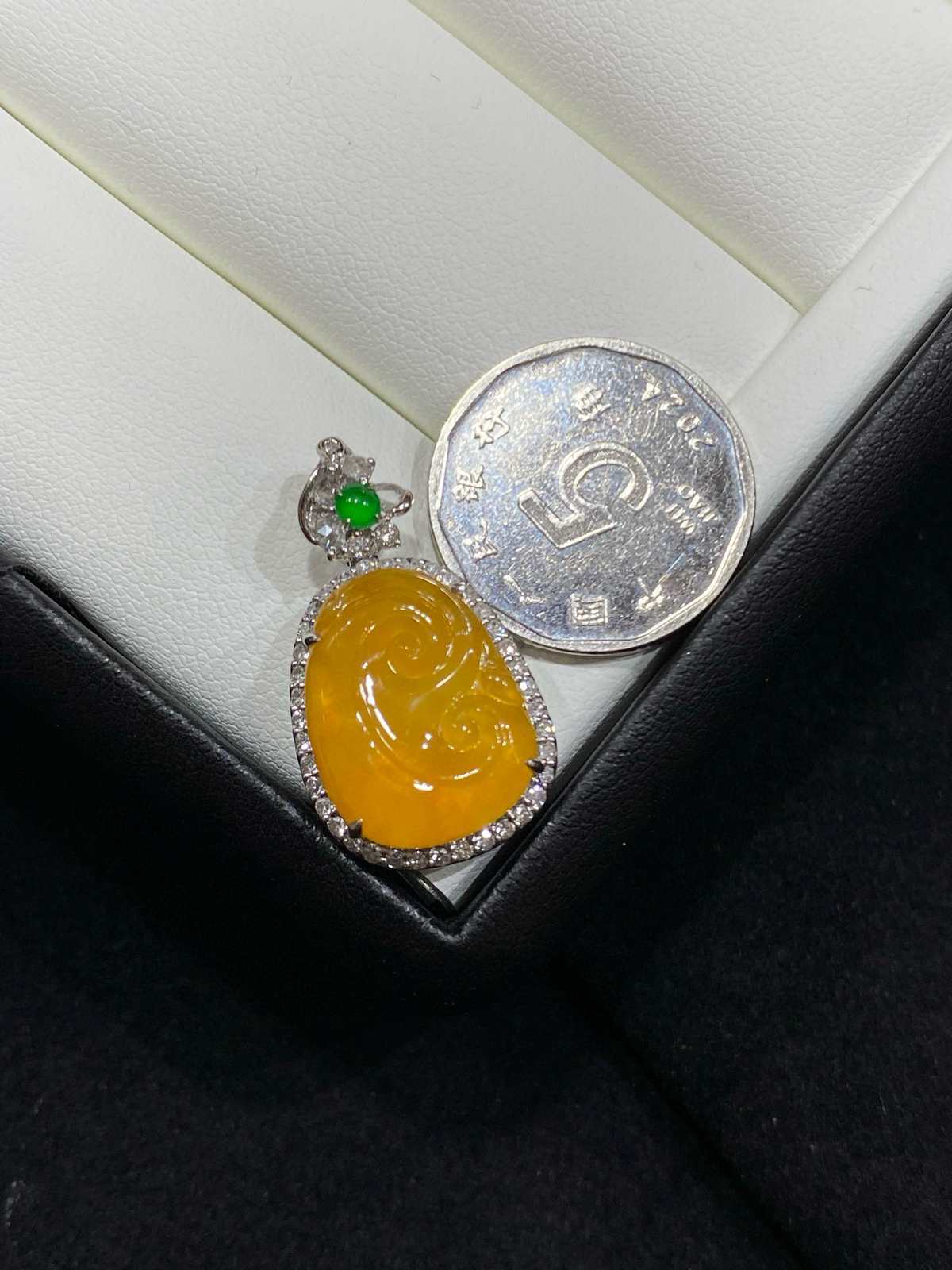 冰黄翡 如意 18k

整体尺寸26.6-15-8.6