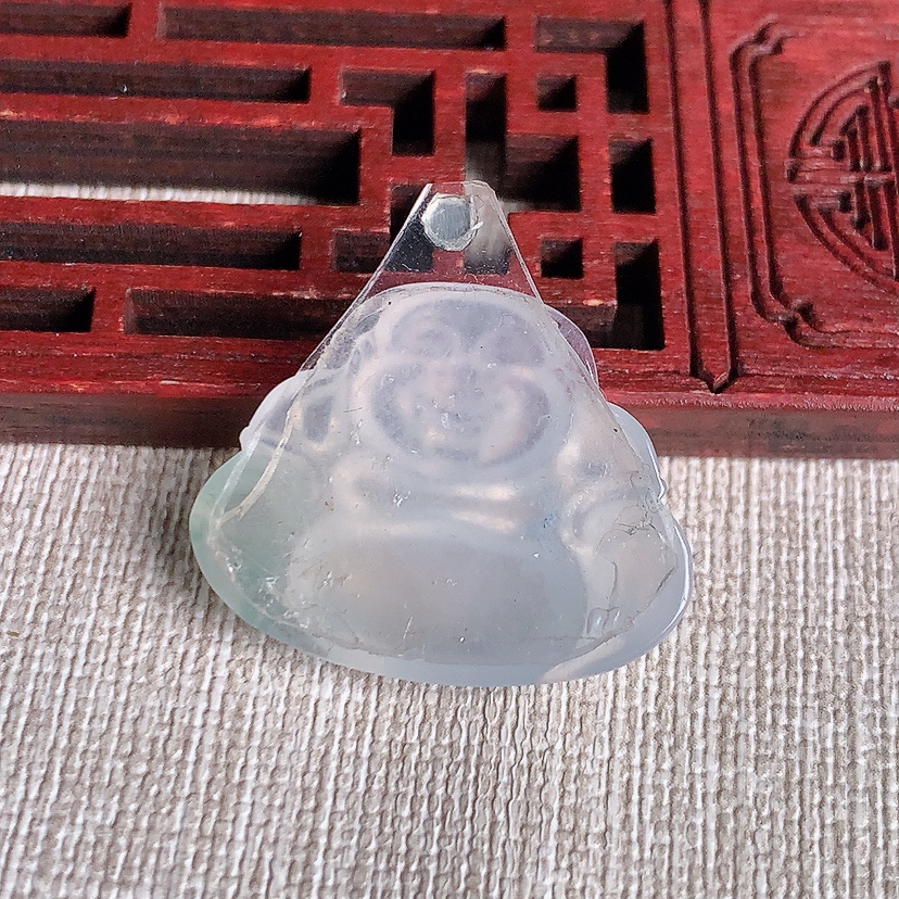 天然A货翡翠飘花佛公镶嵌件 
尺寸21.2-26.8-5.4mm 重量5.50g 0331