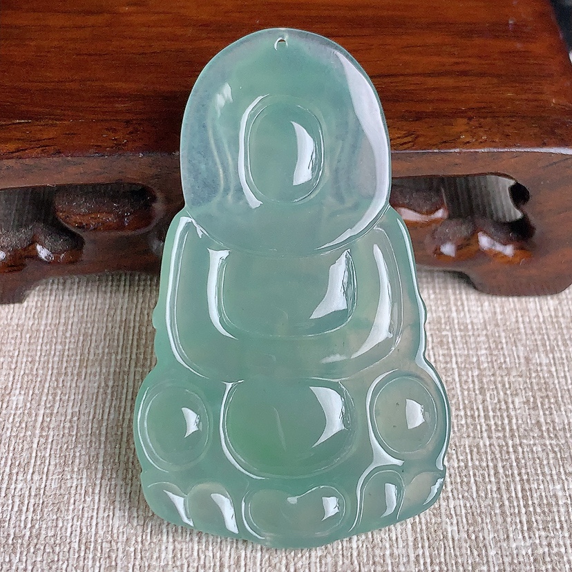 天然A货翡翠晴水正装观音吊坠 
尺寸56.8-34-5mm 重量16.04g 0331