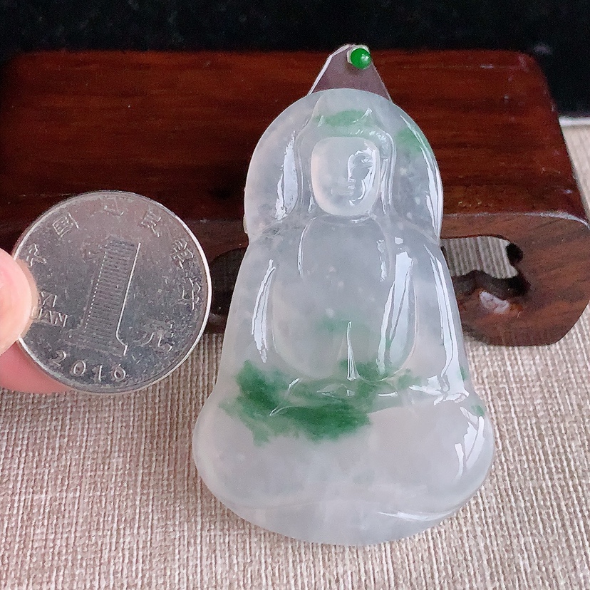 天然A货翡翠飘花观音镶嵌件 
尺寸56.4-36.6-5mm 重量21.96g 0331