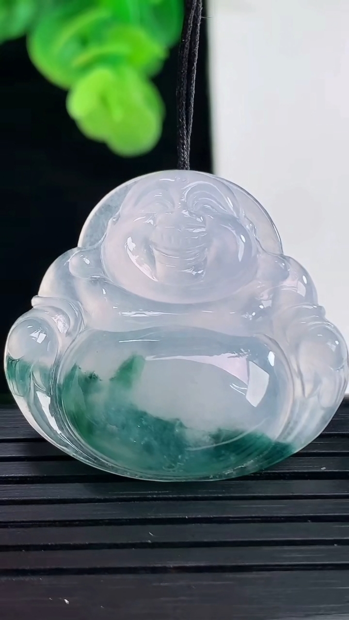 天然A货翡翠飘花佛公吊坠尺寸31.9-34.8-6.1重量:10.90g
4月11日