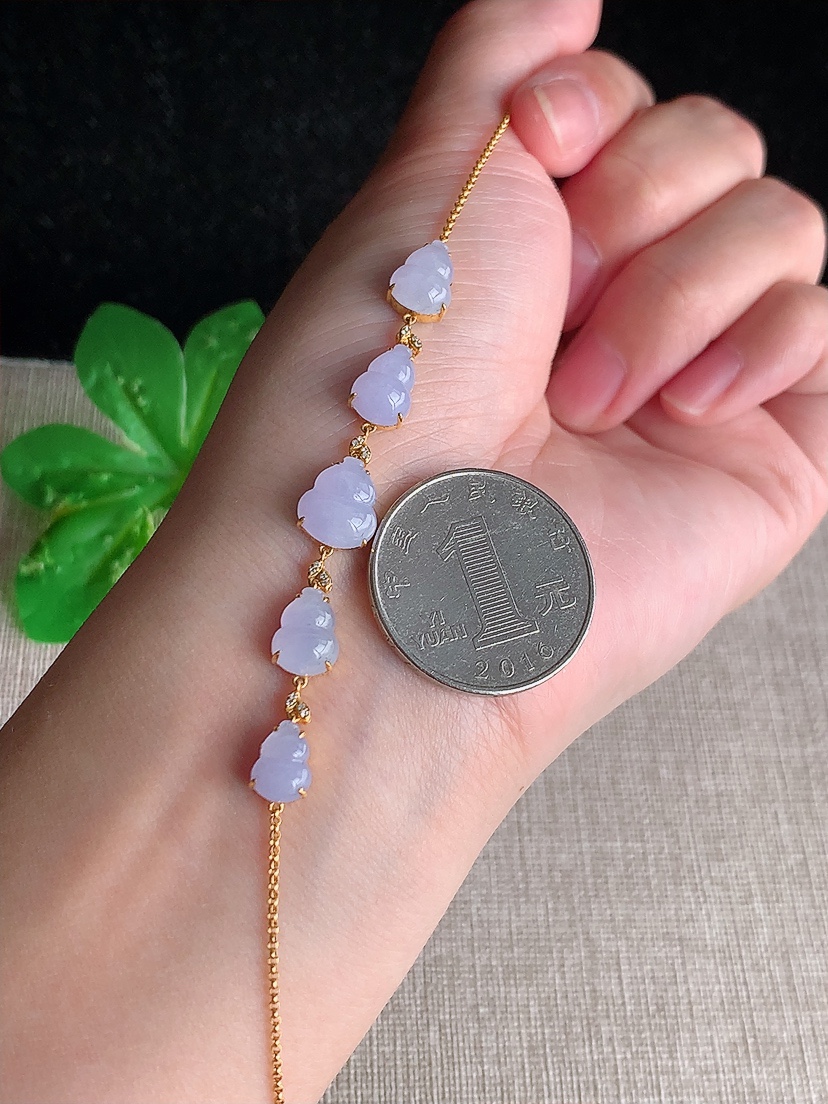 天然A货翡翠18K金镶嵌紫罗兰葫芦手链 
尺寸9.2-8-4.4mm 重量4.14g 0410