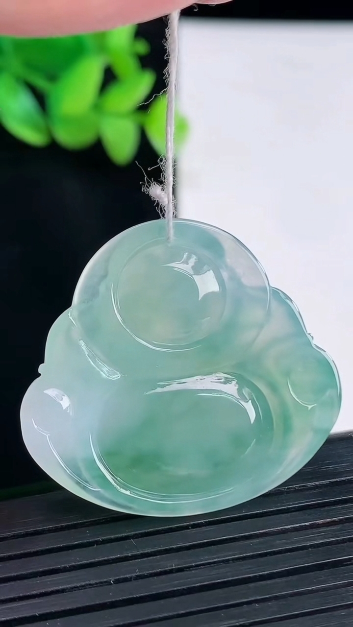 天然A货翡翠冰种飘花佛公吊坠，尺寸32-35-6重量:9.87g
4月13日