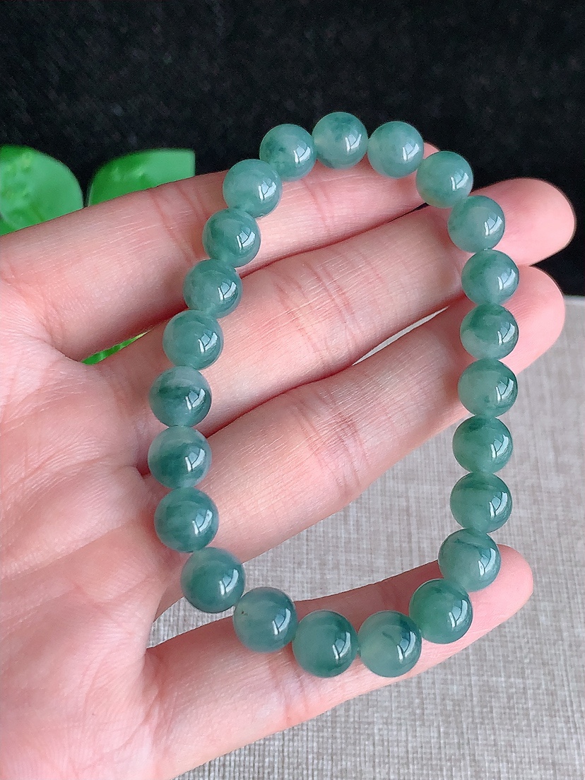 天然A货翡翠飘花圆珠佛珠手串23颗 
尺寸7.3mm 重量17.85g 0418