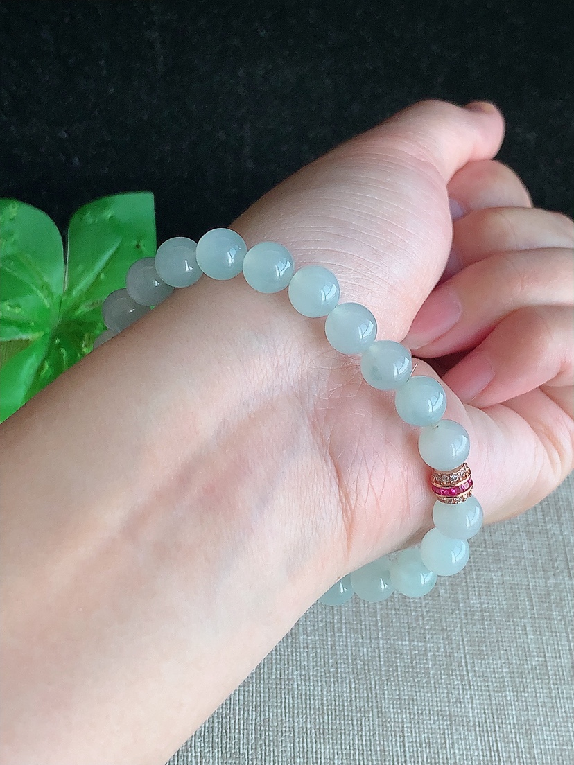 天然A货翡翠飘花圆珠佛珠手串23颗 
尺寸7.4mm 重量19.11g 0418