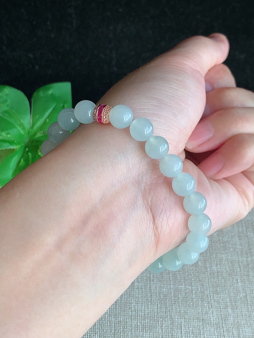 天然A货翡翠飘花圆珠佛珠手串23颗 
尺寸7.4mm 重量19.11g 0418