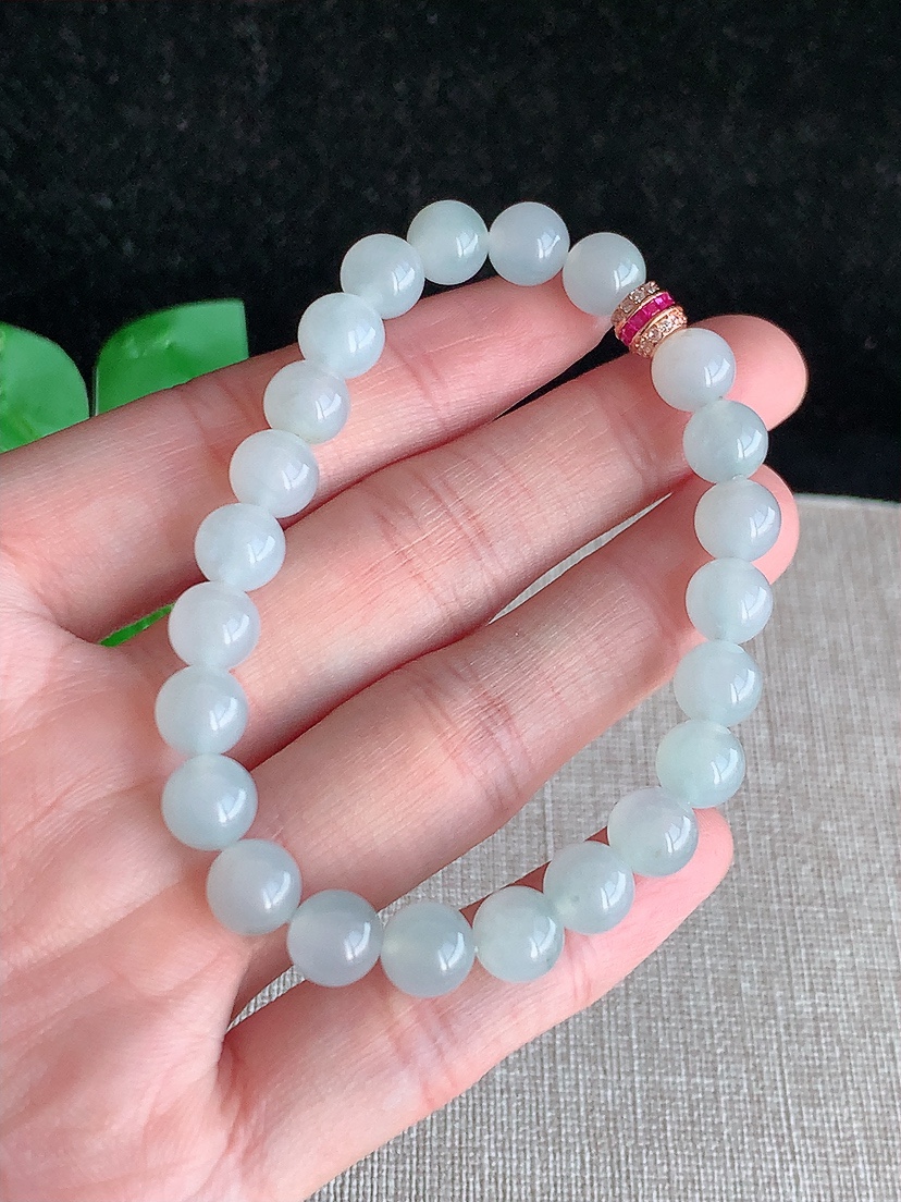 天然A货翡翠飘花圆珠佛珠手串23颗 
尺寸7.4mm 重量19.11g 0418