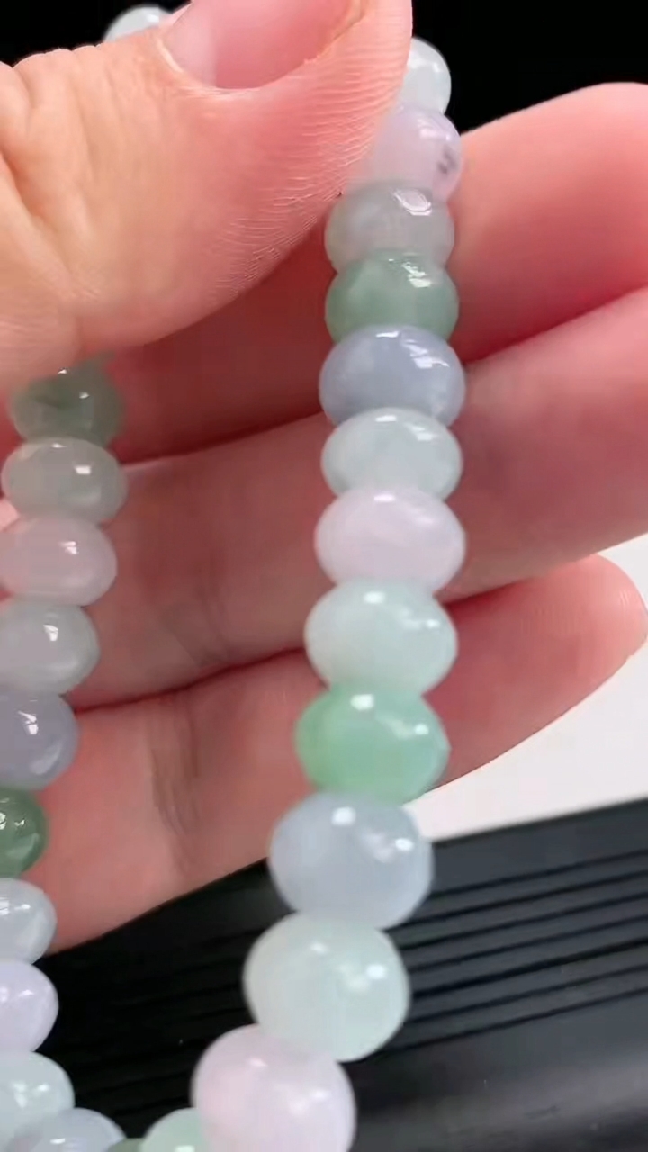 天然A货翡翠紫罗兰飘花算盘珠手串，尺寸9-6.2-30颗重量:29.47g4月22日
工厂直销收藏佳品,种好水足，色泽均匀，有种有色，上手高大气！