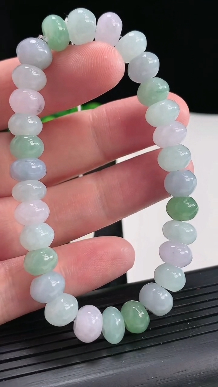 天然A货翡翠紫罗兰飘花算盘珠手串，尺寸9-6.2-30颗重量:29.47g4月22日
工厂直销收藏佳品,种好水足，色泽均匀，有种有色，上手高大气！