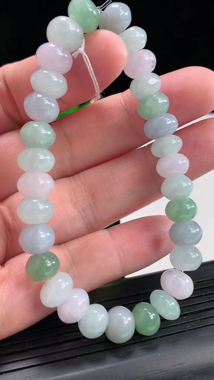 天然A货翡翠紫罗兰飘花算盘珠手串，尺寸9-6.2-30颗重量:29.47g4月22日
工厂直销收藏佳品,种好水足，色泽均匀，有种有色，上手高大气！