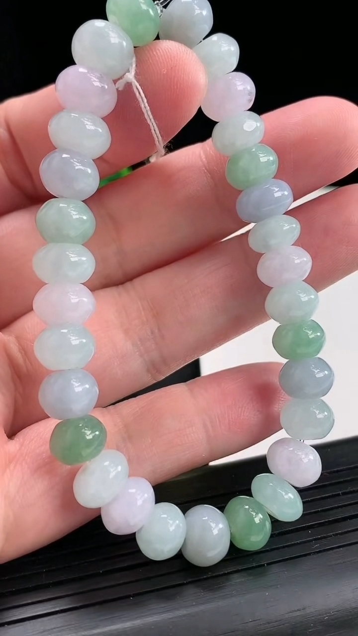 天然A货翡翠紫罗兰飘花算盘珠手串，尺寸9-6.2-30颗重量:29.47g4月22日
工厂直销收藏佳品,种好水足，色泽均匀，有种有色，上手高大气！