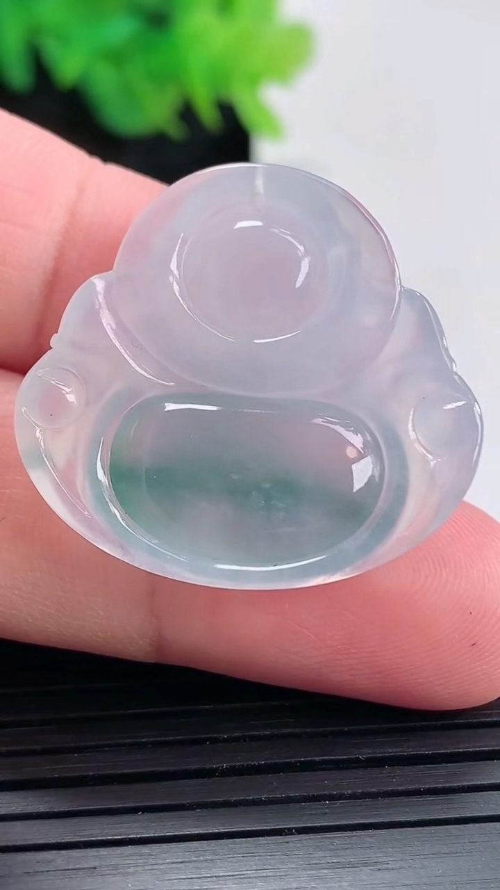 天然A货翡翠种飘花佛公吊坠，尺寸28.5-30.5-6重量:8.00g
4月23日