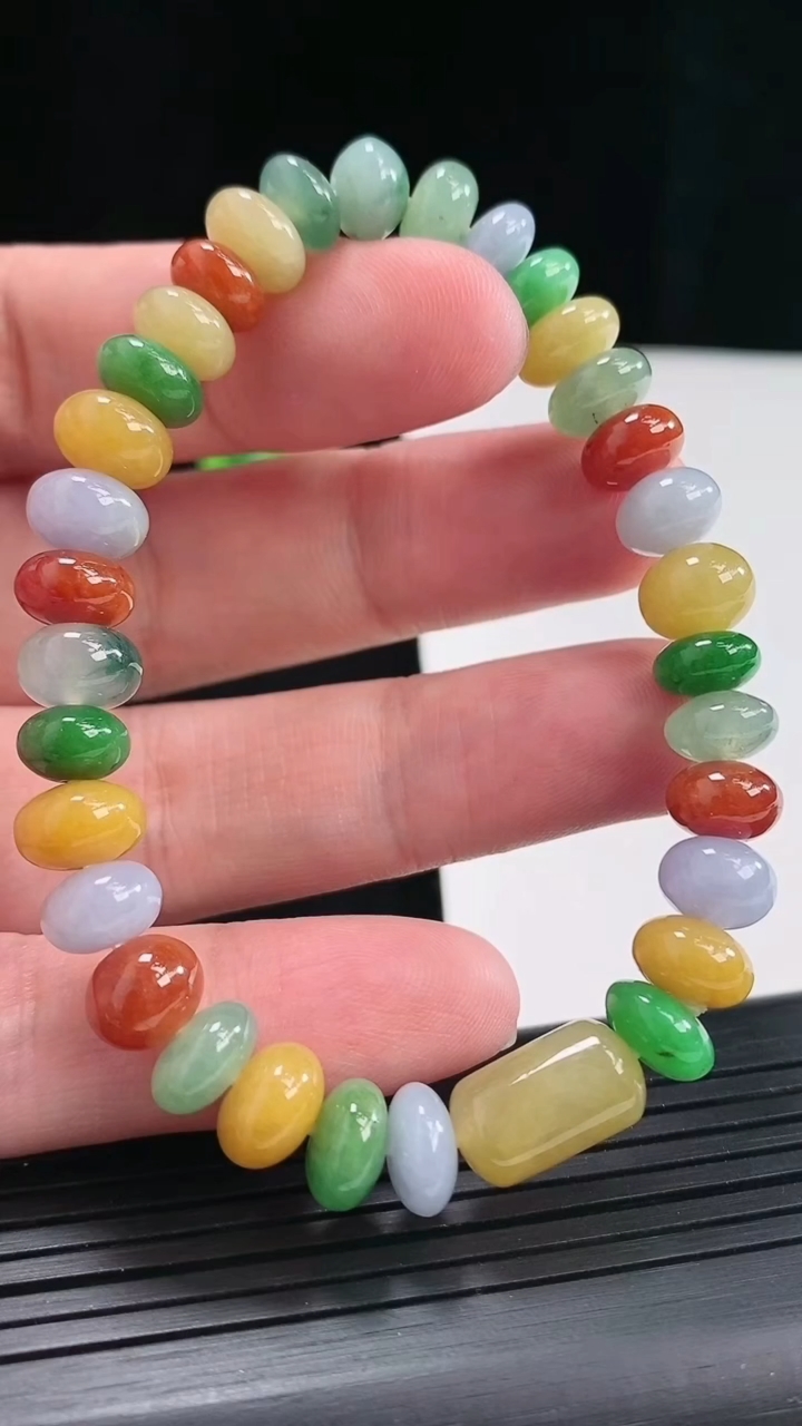 天然A货翡翠三彩算盘珠路路通手串，尺寸12.6-8，8-5.5重量:24.00g4月27日
工厂直销