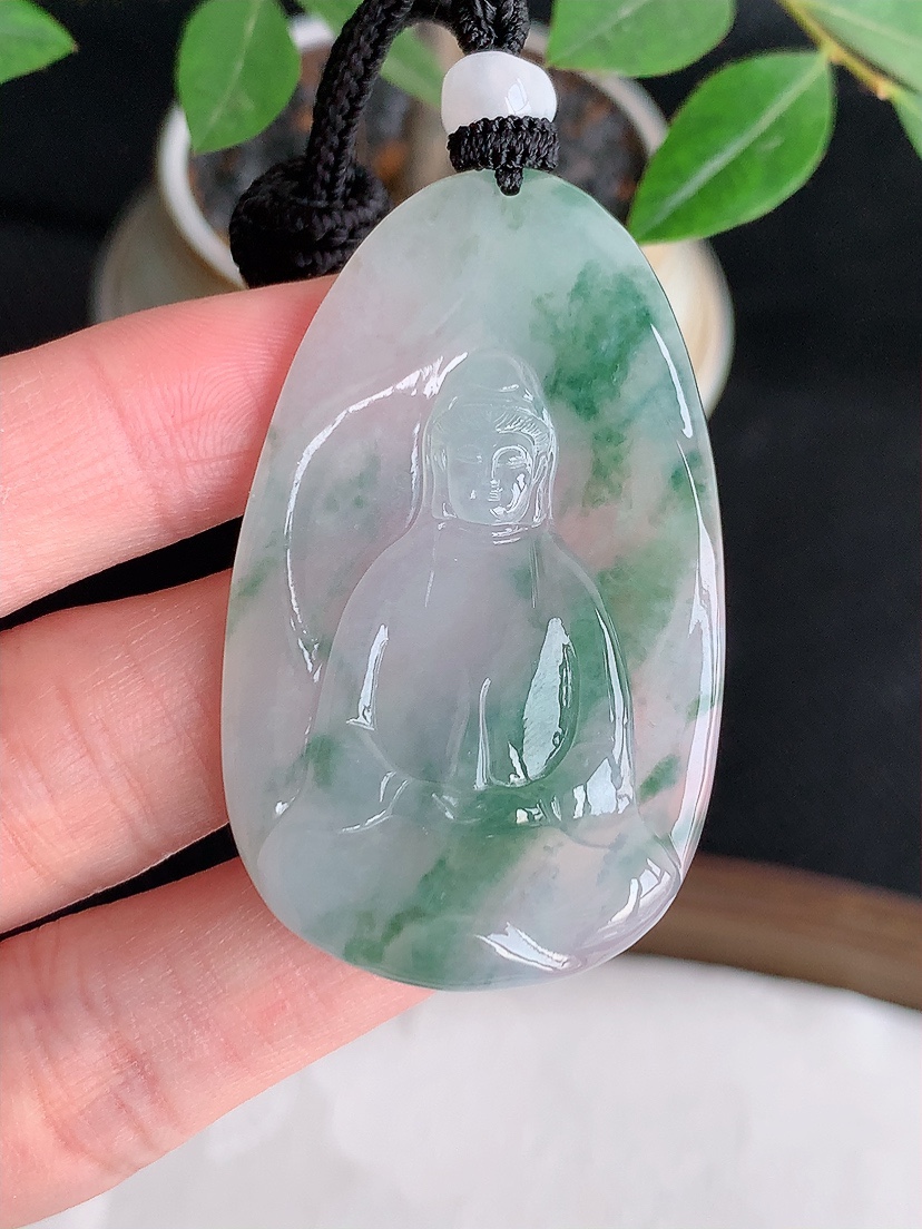 天然A货翡翠飘花观音吊坠 
尺寸49.5-30-5.4mm 重量21.90g 0426