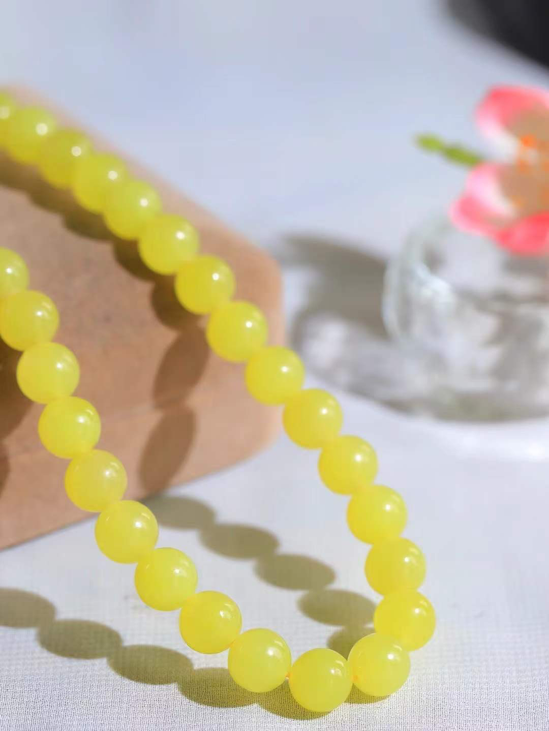 【珠圆玉润.项链】

精品和田玉黄口鸡油黄珠圆玉润项链，暖黄如蜜，象征“金玉满堂”的富贵与温润谦和的品性；项链承载断除百八烦恼的祈愿，亦合四时流转之圆满，腕间颈间皆藏着人们对平安顺遂、福泽绵长的温柔期许。
重56克  尺寸取一8.5mm  45353100L