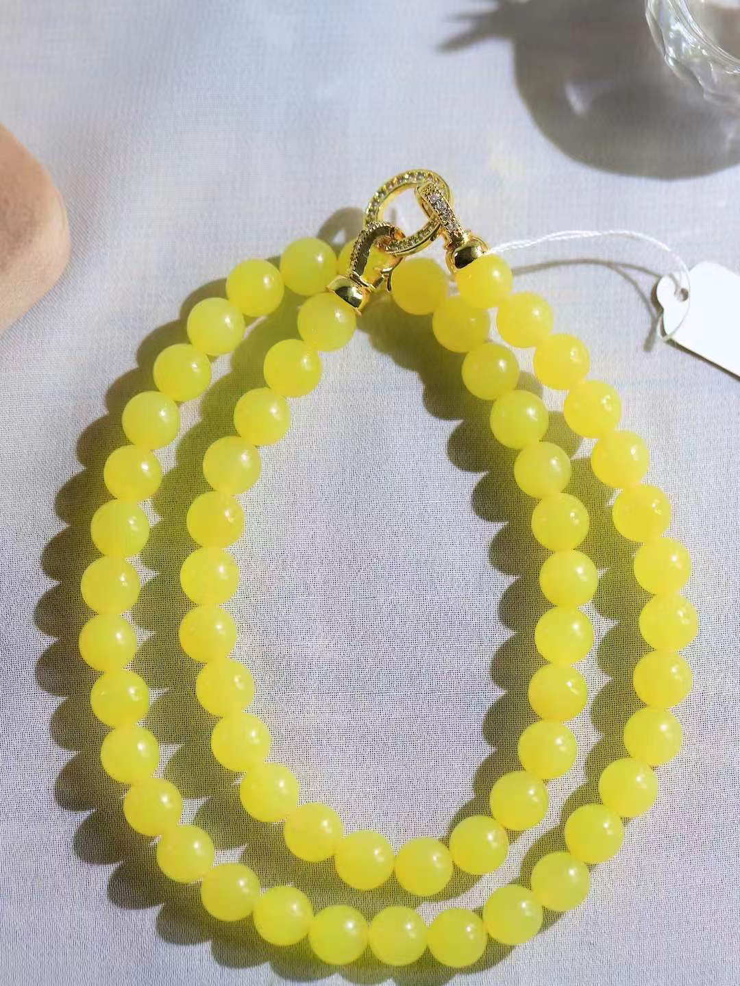 【珠圆玉润.项链】

精品和田玉黄口鸡油黄珠圆玉润项链，暖黄如蜜，象征“金玉满堂”的富贵与温润谦和的