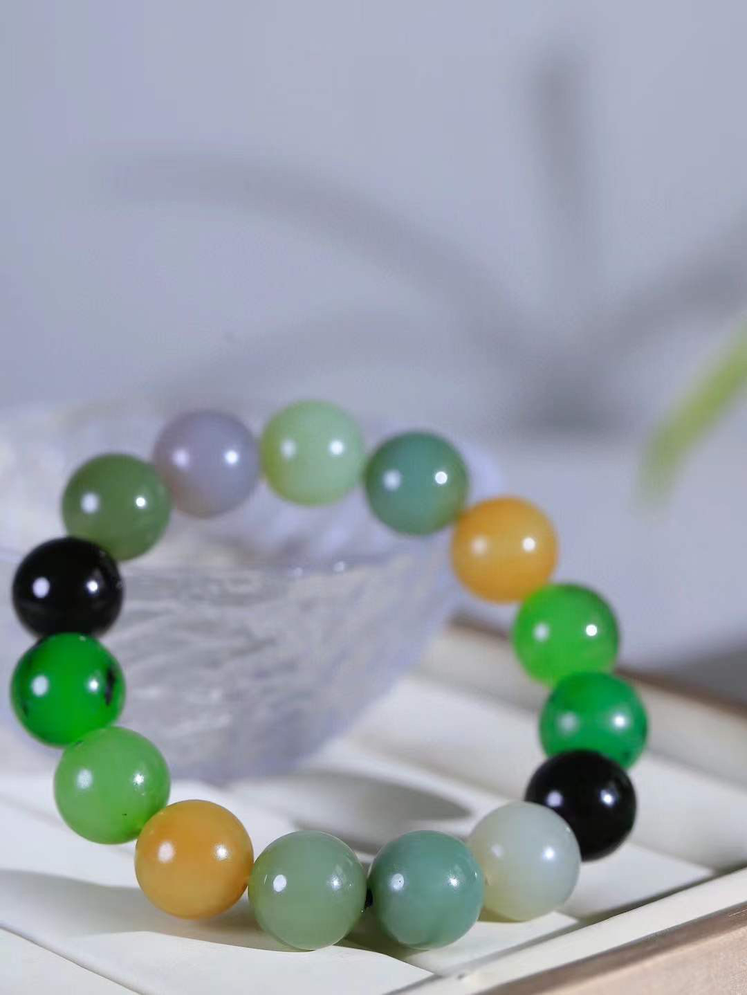 【福运相伴.多宝手串】

货头精选 和田玉多宝圆珠手串，每一颗玉石都凝聚自然的灵气与岁月的沉淀，寓意福禄寿喜，守护您的平安与幸福。佩戴它，感受千年玉文化的温润与优雅。重64.5克  尺寸取一14.2mm  45353033T