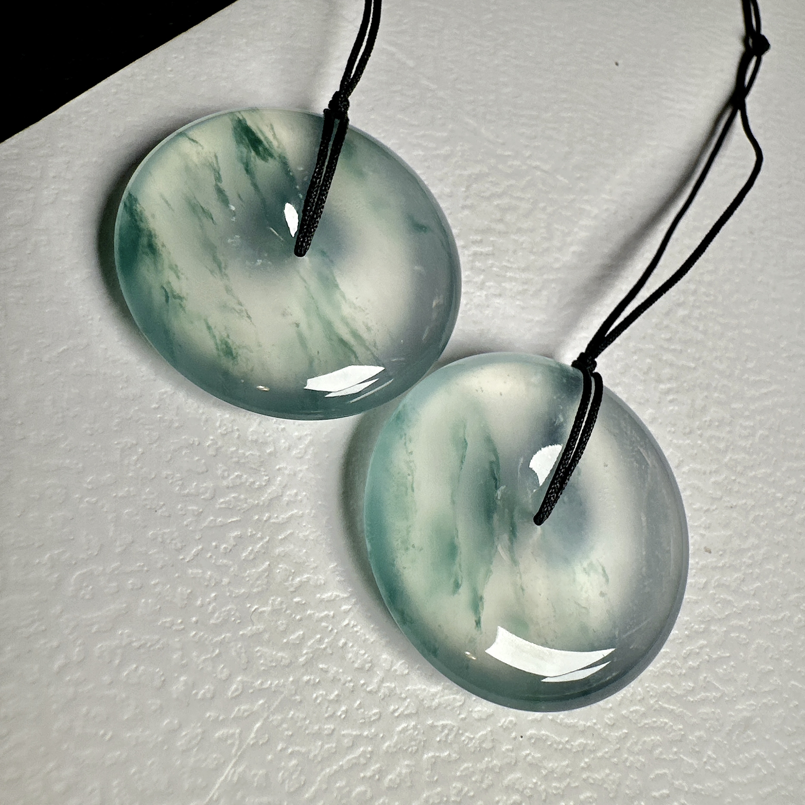 【冰种飘花平安扣一对】质地非常细腻干净，冰润十足，种老冰透，收藏品质，裸石尺寸28*5.8毫米