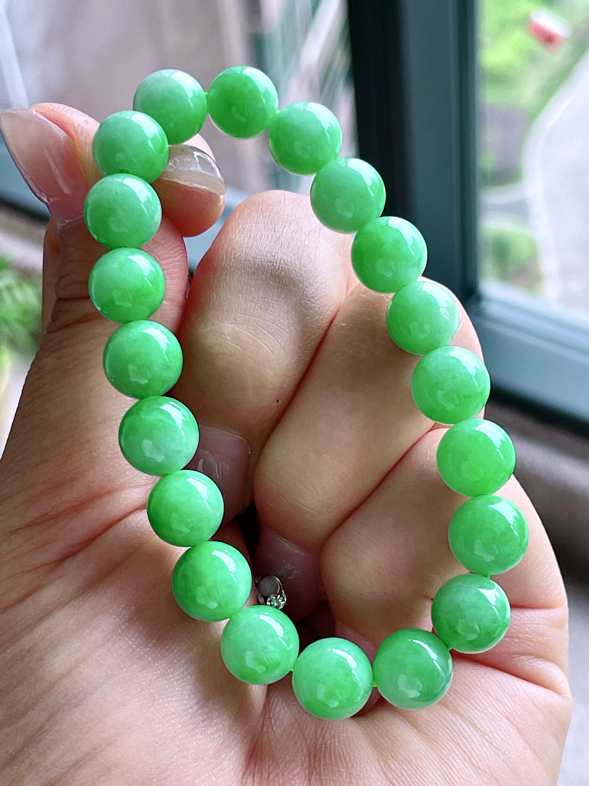 冰阳绿圆珠珠子手串
【尺寸】9mm