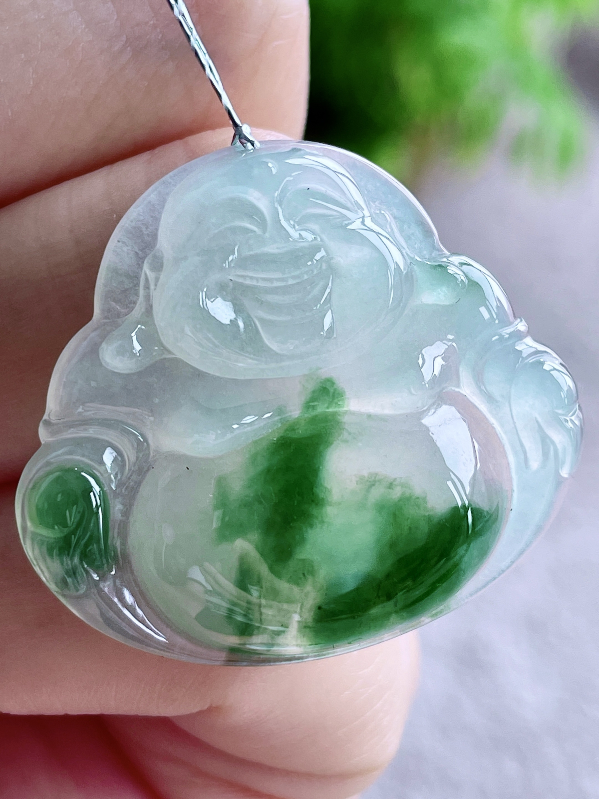 【裸石】冰飘绿花佛公吊坠
【说明】缅料 性价比高  飘花
【尺寸】31.3-34.9-5.8..