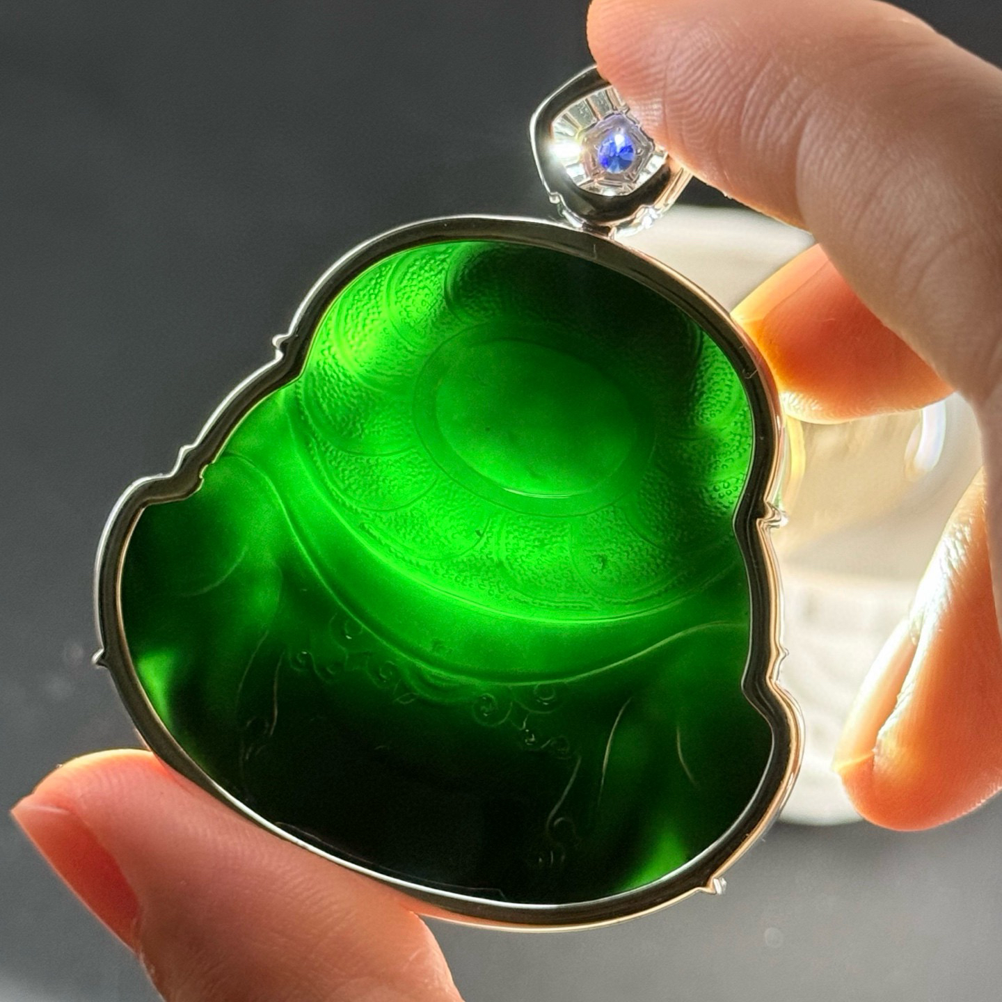 18k墨翠大肚佛 种好色正 饱满大气 打灯通透 黑度极好 油性十足  尺寸55.2