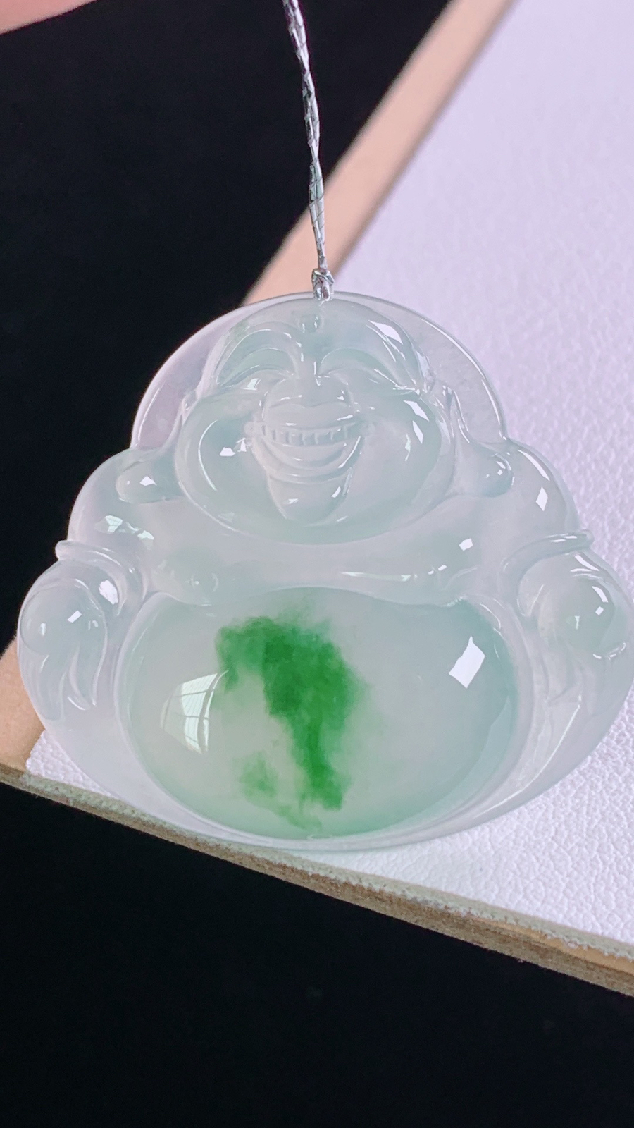 冰飘绿佛公
翠色灵动，胶感十足，
尺寸:30.9-34.5-5.8mm 8