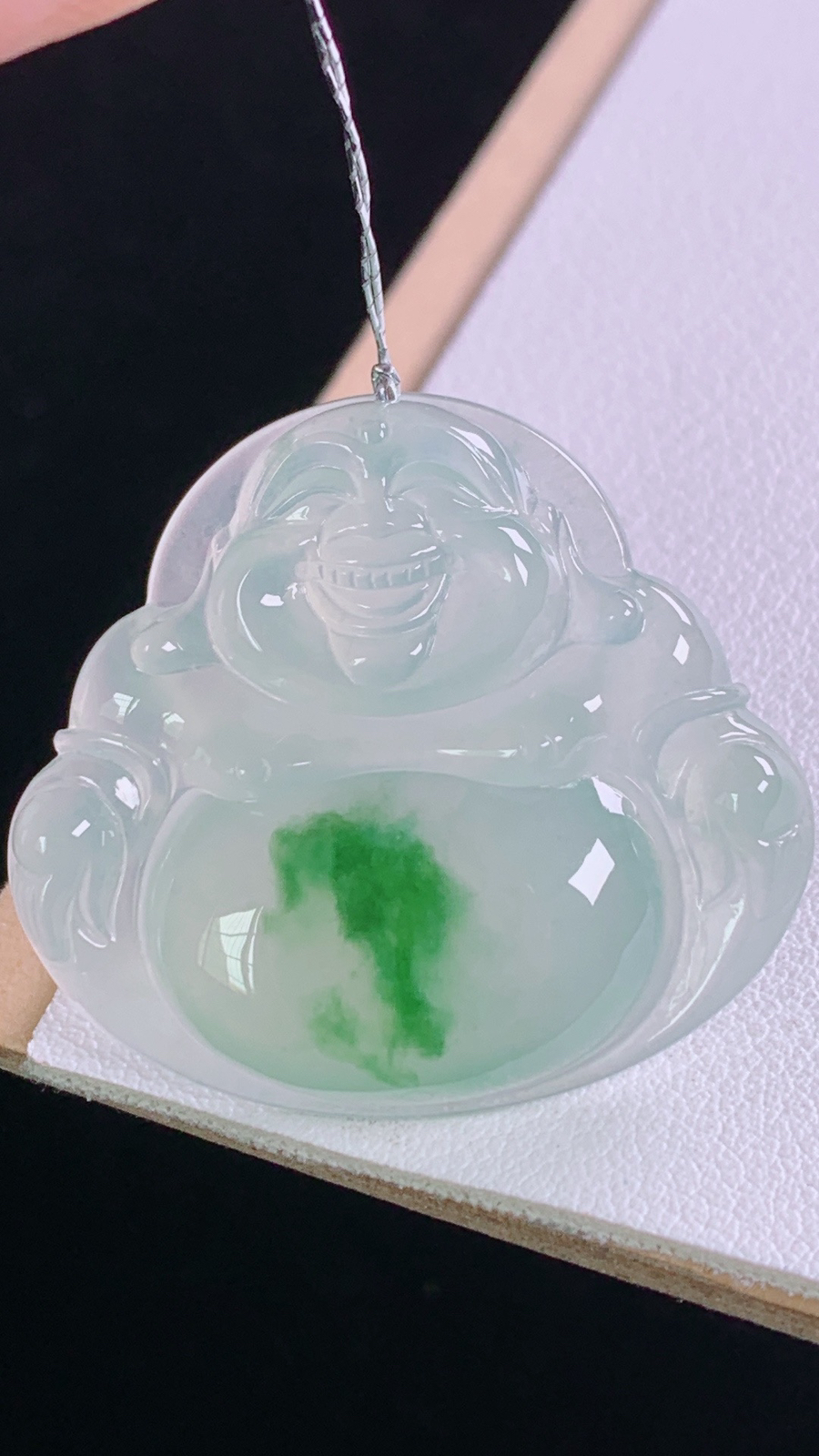 冰飘绿佛公
翠色灵动，胶感十足，
尺寸:30.9-34.5-5.8mm 8