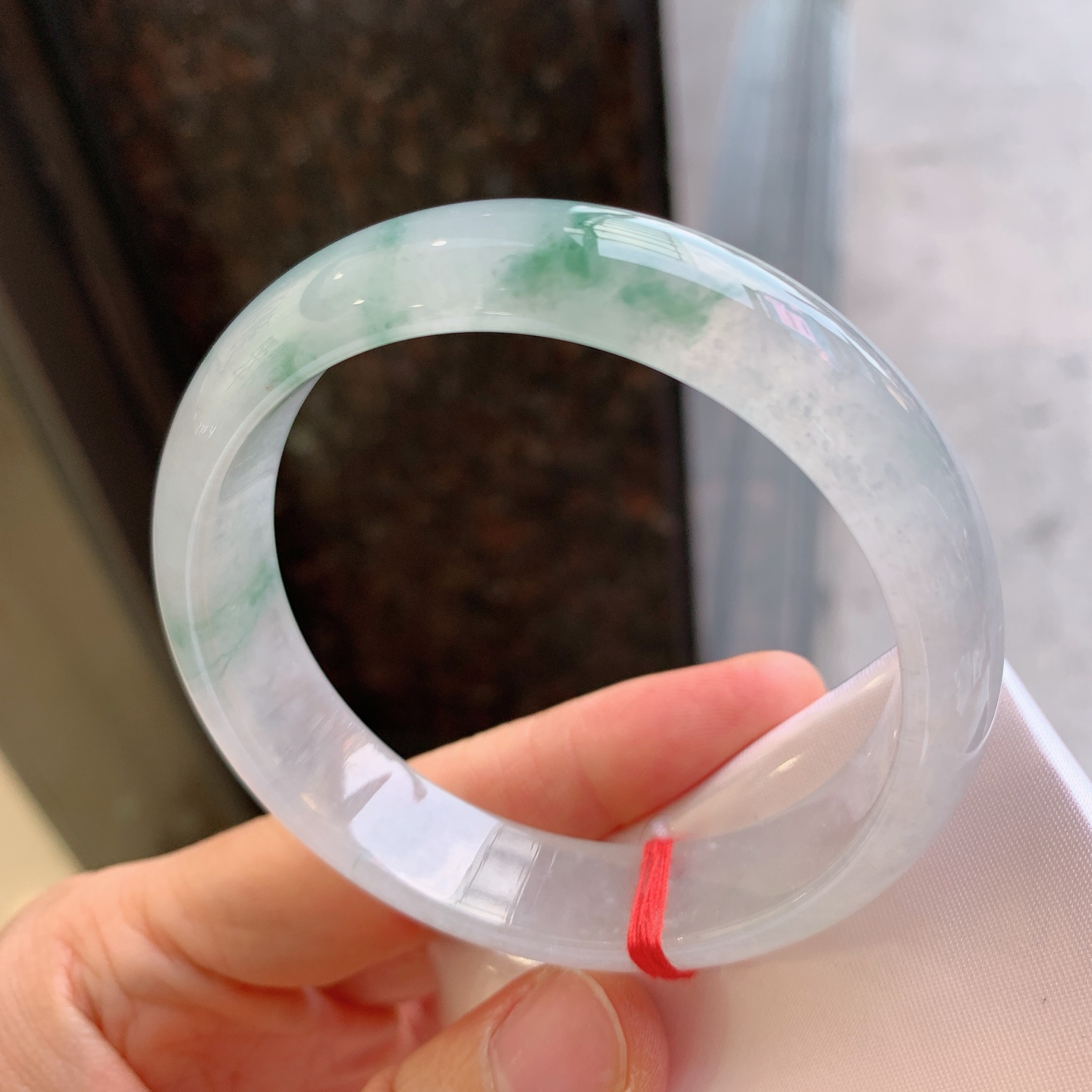 正圈冰种飘花，无裂，尺寸：57.5/14/7.8，冰润