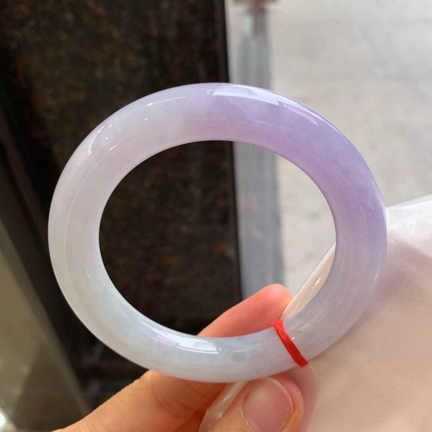 圆条粉紫，有纹、有裂，尺寸59.2/12，大圈口