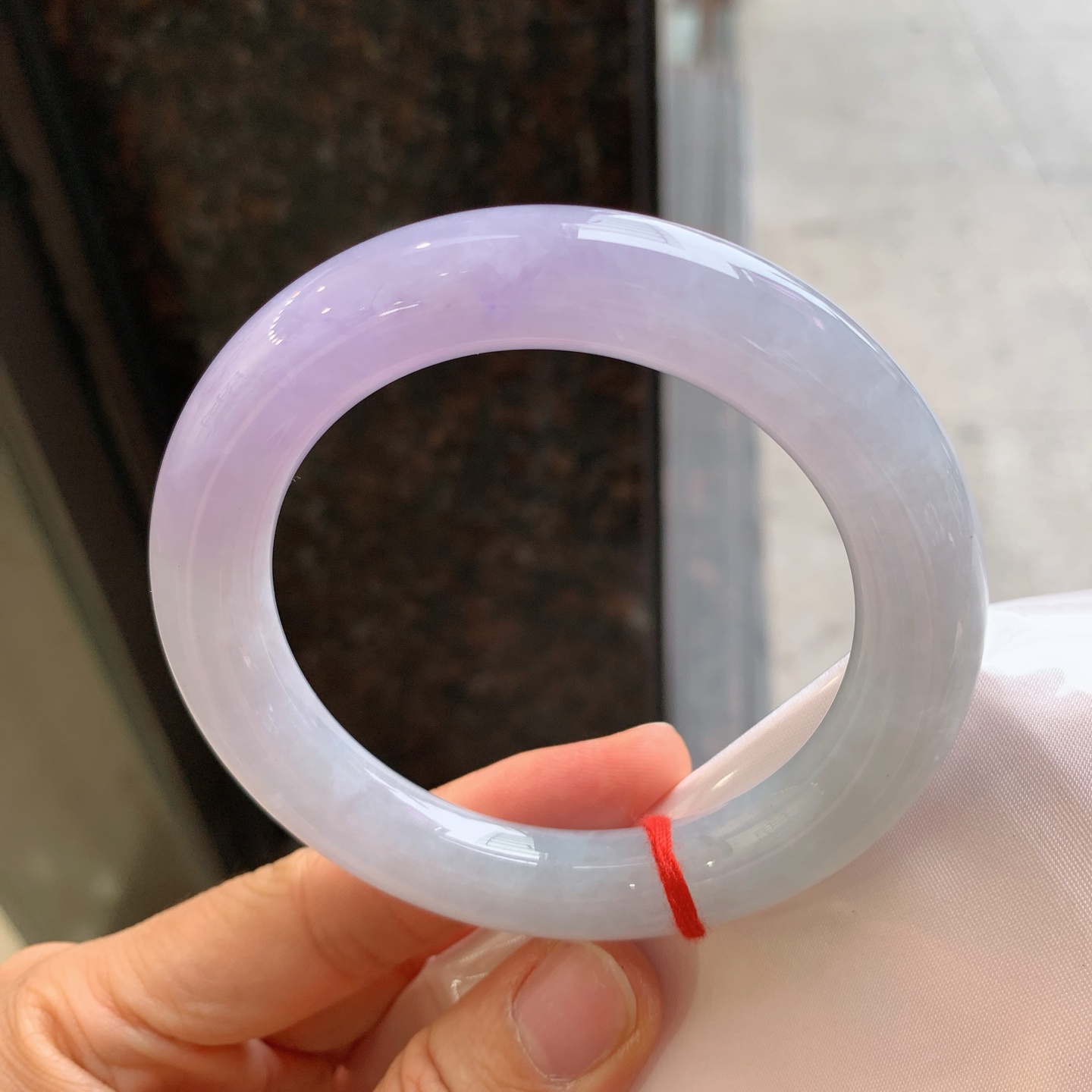 圆条粉紫，有纹、有裂，尺寸59.2/12，大圈口