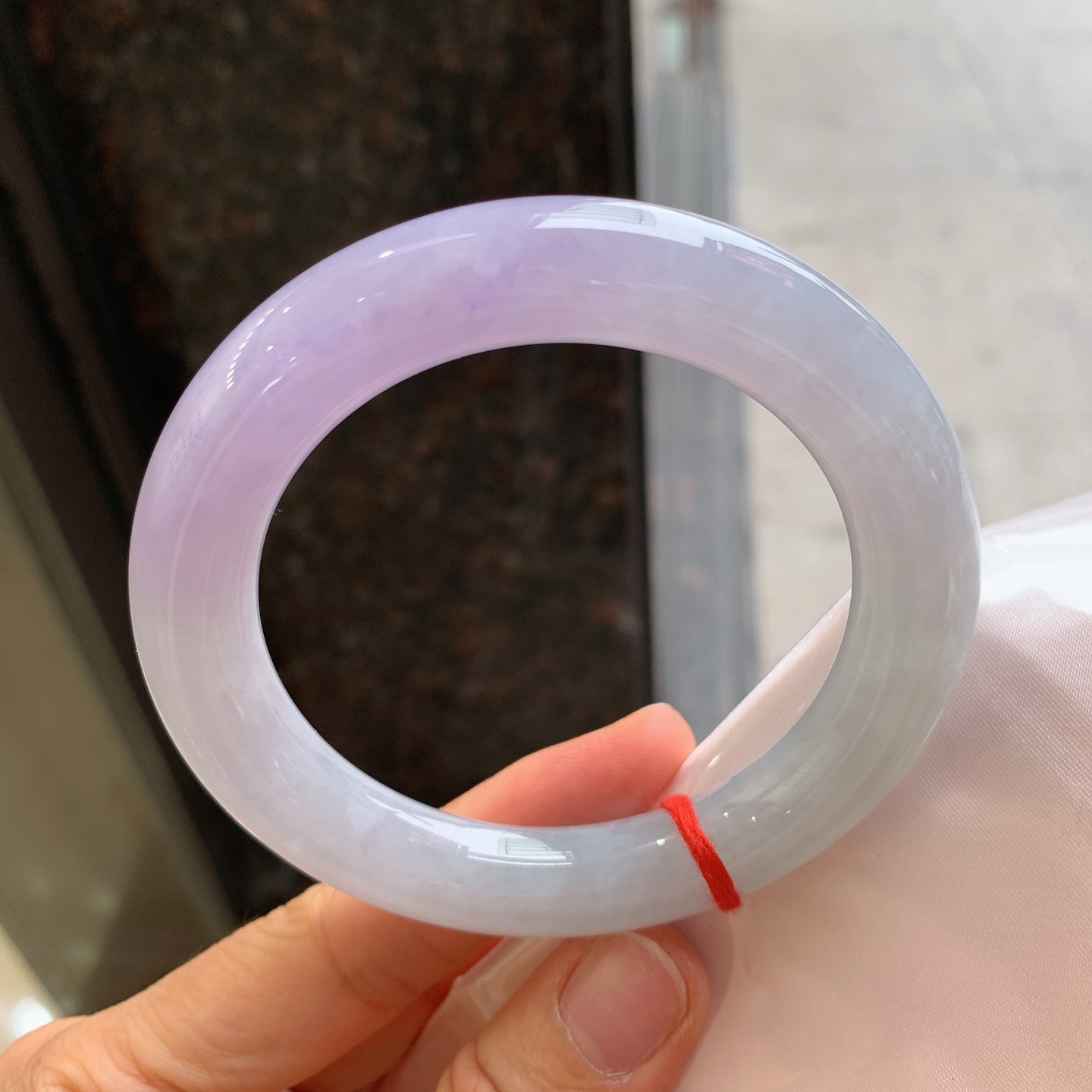 圆条粉紫，有纹、有裂，尺寸59.2/12，大圈口