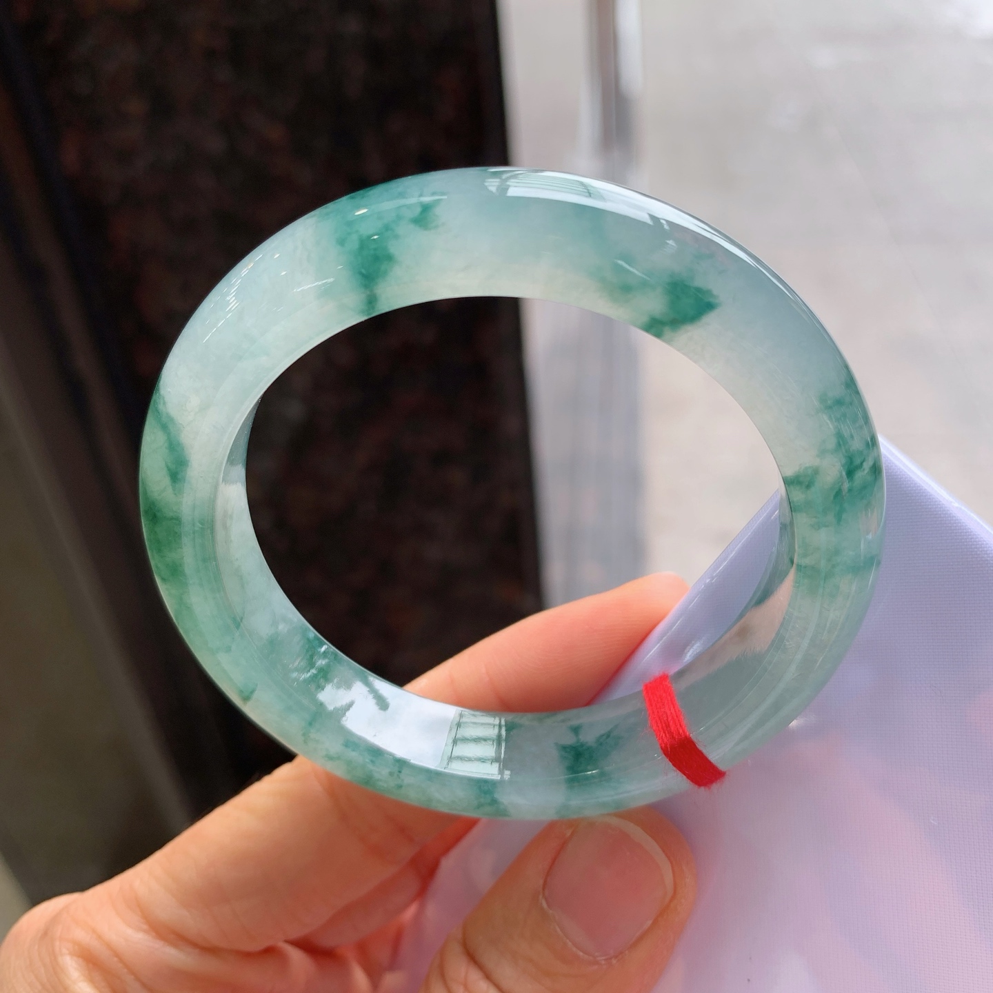 正圈冰种飘花，无裂，尺寸：54.8/11.8/9.1，花色漂亮