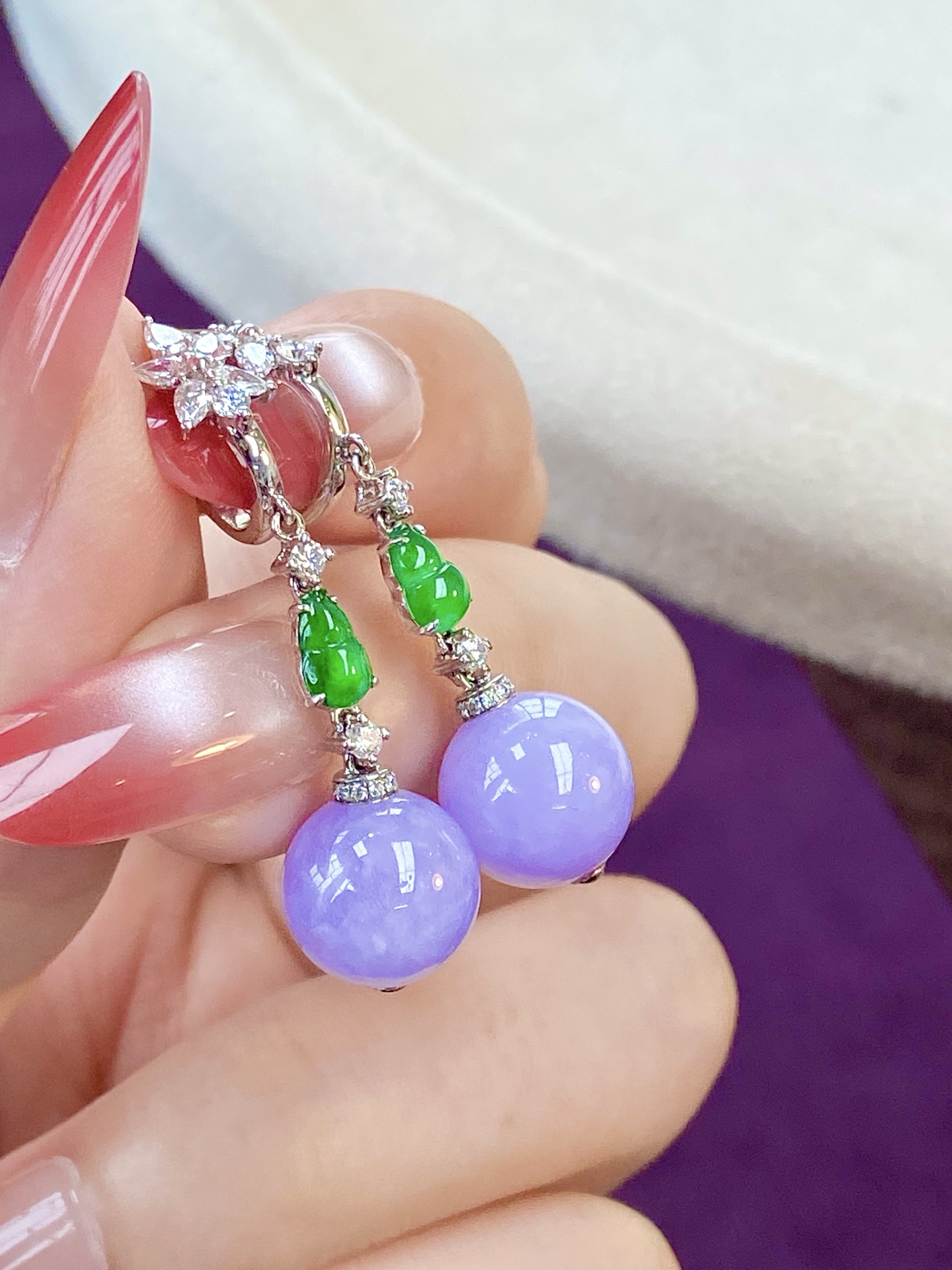 ️冰紫耳坠，紫气东来，翠色葫芦点缀，是福禄也是灵动，佩戴上耳瞬间提升整体气质 温柔又显贵：38.8，裸石：10.5mm，无裂