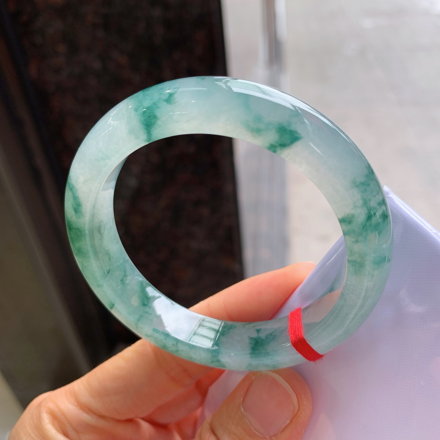 正圈冰种飘花，无裂，尺寸：54.8/11.8/9.1，花色漂亮