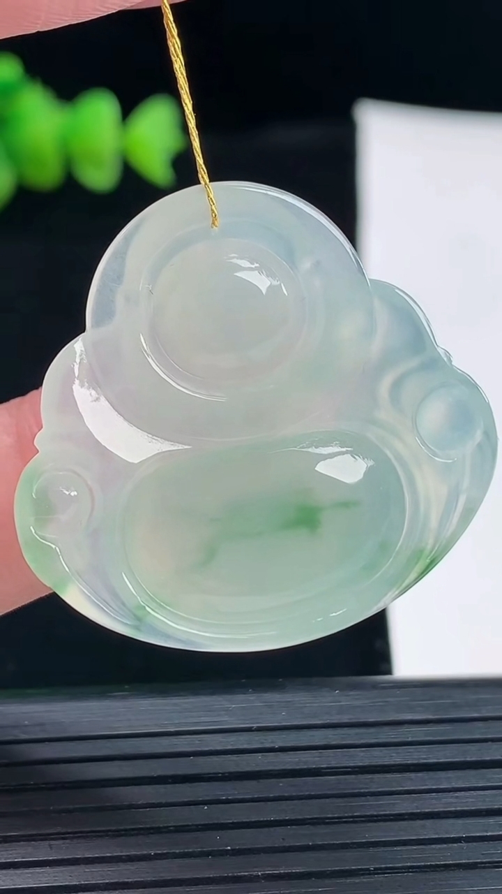 天然A货翡翠冰种飘花佛公吊坠，尺寸33-35-5.8重量:10.06g
5月9日