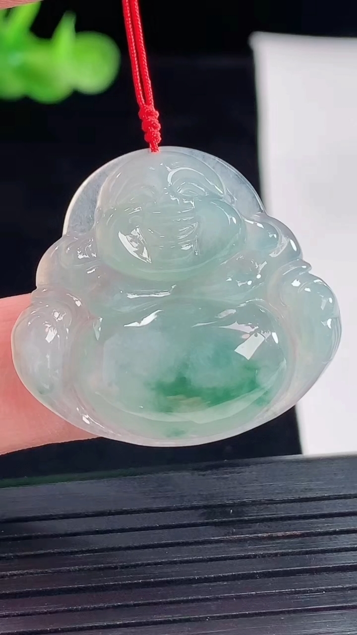 天然A货翡翠飘花佛公吊坠，尺寸29-31-5.6重量:7.12g
5月9日