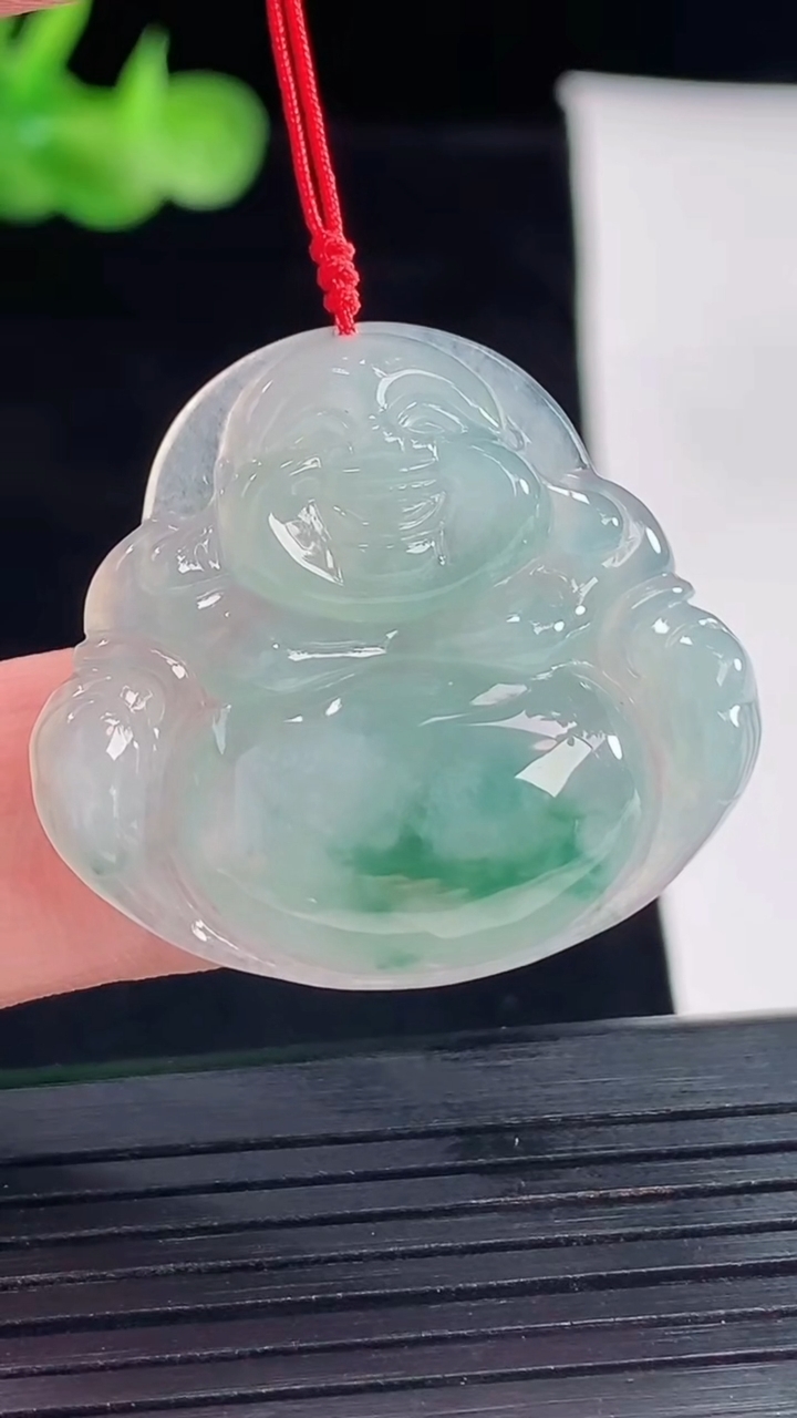 天然A货翡翠飘花佛公吊坠，尺寸29-31-5.6重量:7.12g
5月9日