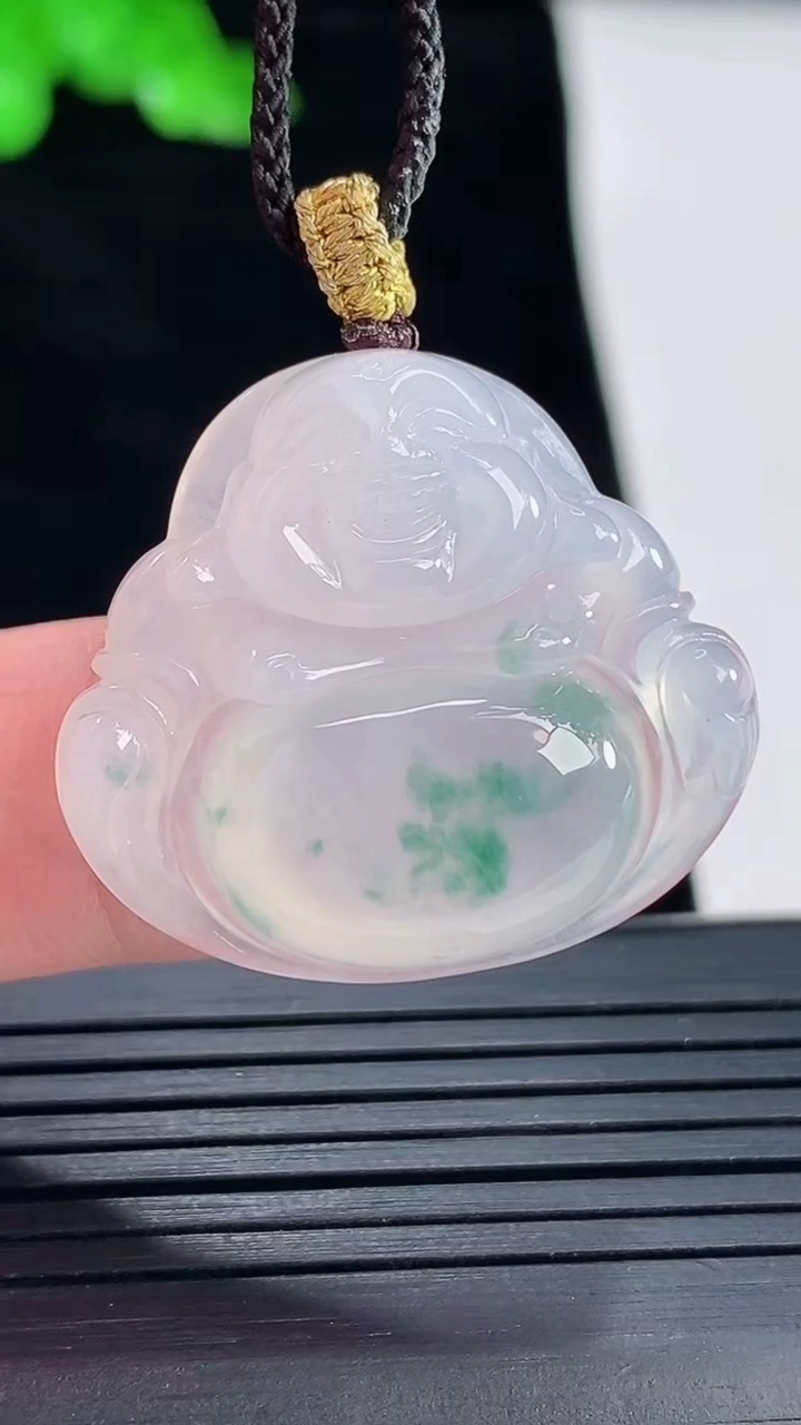天然A货翡翠种飘花佛公吊坠，尺寸25-28.5-6.2重量:7.05g
5月16日