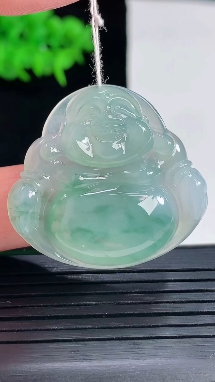 天然A货翡翠冰种飘花佛公吊坠，尺寸32-35-6重量:9.85g
5月18日