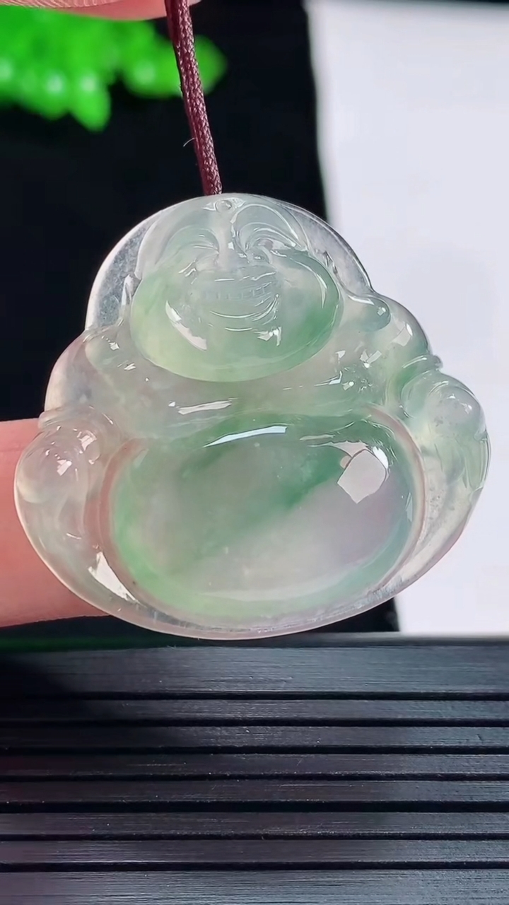 天然A货翡翠种飘花佛公吊坠，尺寸31-33.5-5.8重量:8.95g
5月24日