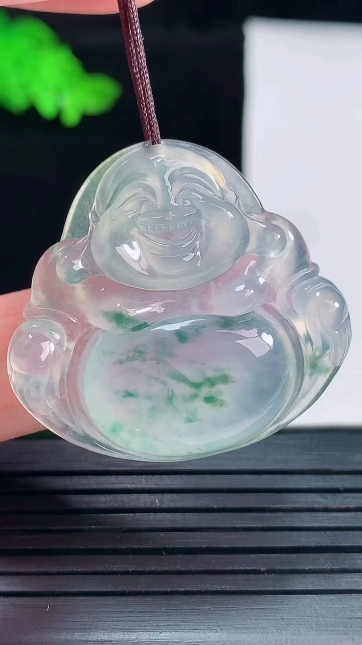 天然A货翡翠种飘花佛公吊坠，尺寸32-35-5.5重量:9.57g
5月29日