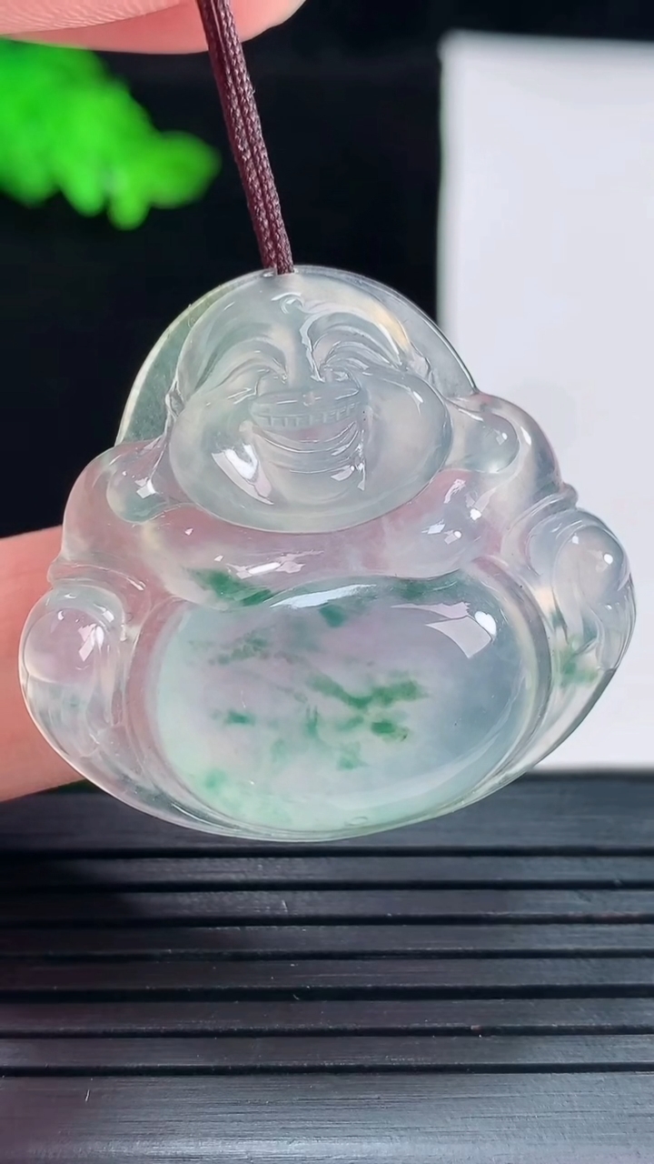 天然A货翡翠种飘花佛公吊坠，尺寸32-35-5.5重量:9.57g
5月29日